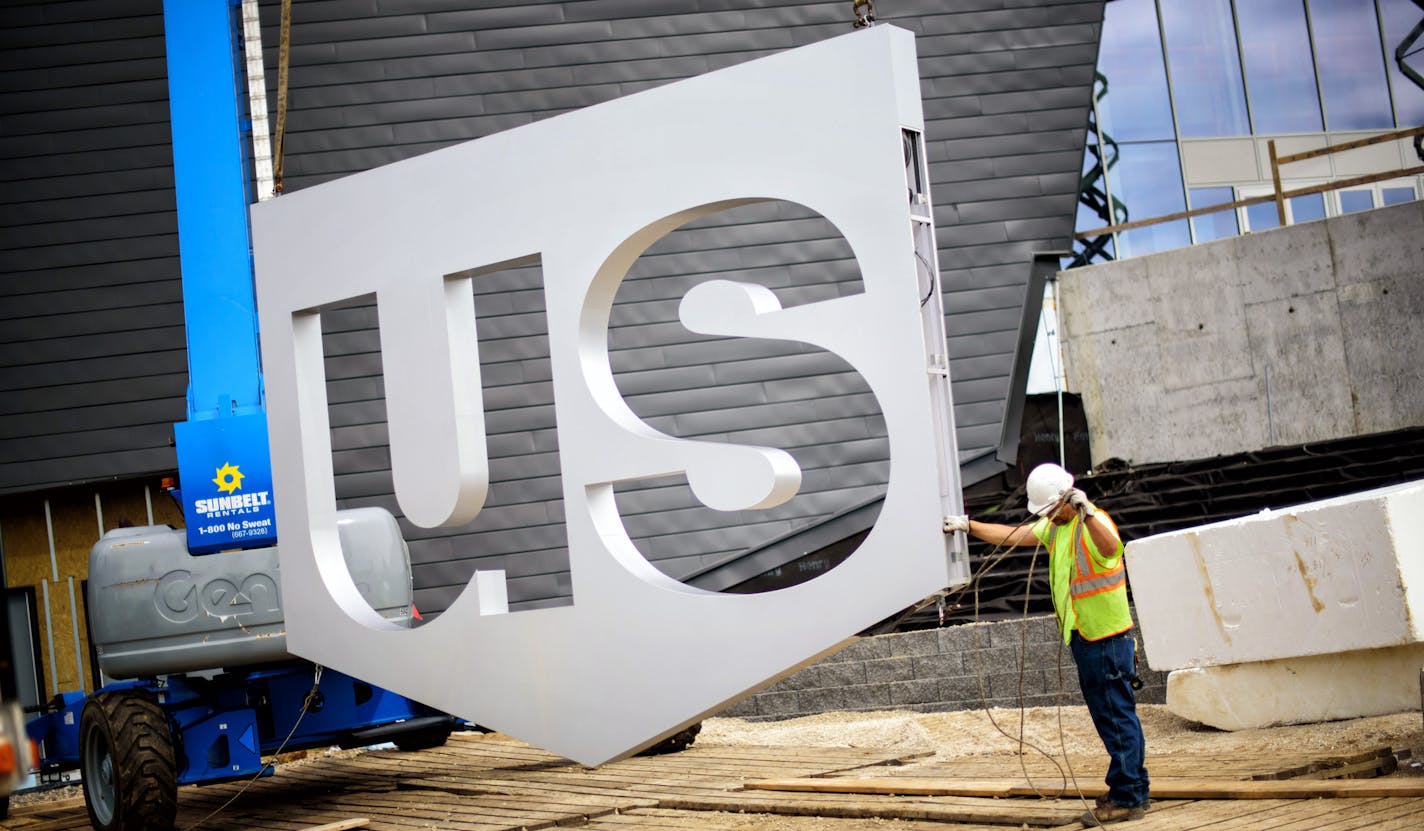 The first of the USBank Stadium signage went into place today. ] GLEN STUBBE * gstubbe@startribune.com Monday, July 20, 2015 A tour of the USBank Stadium. It has a roof made of ETFE, or ethylene-tetra-fluoro-ethylene.