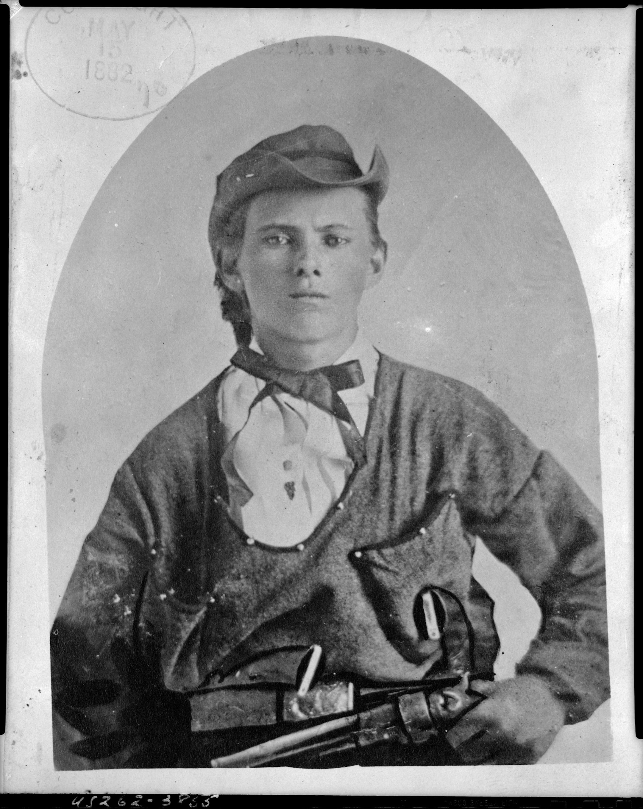 Jesse James, half-length portrait, facing front, holding handgun in left hand at his waist. St. Louis: Taylor Copying Co., [1864] c1882 May 15. James, Jesse,--1847-1882. Library of Congress Prints and Photographs Division Washington, D.C. 20540 USA.