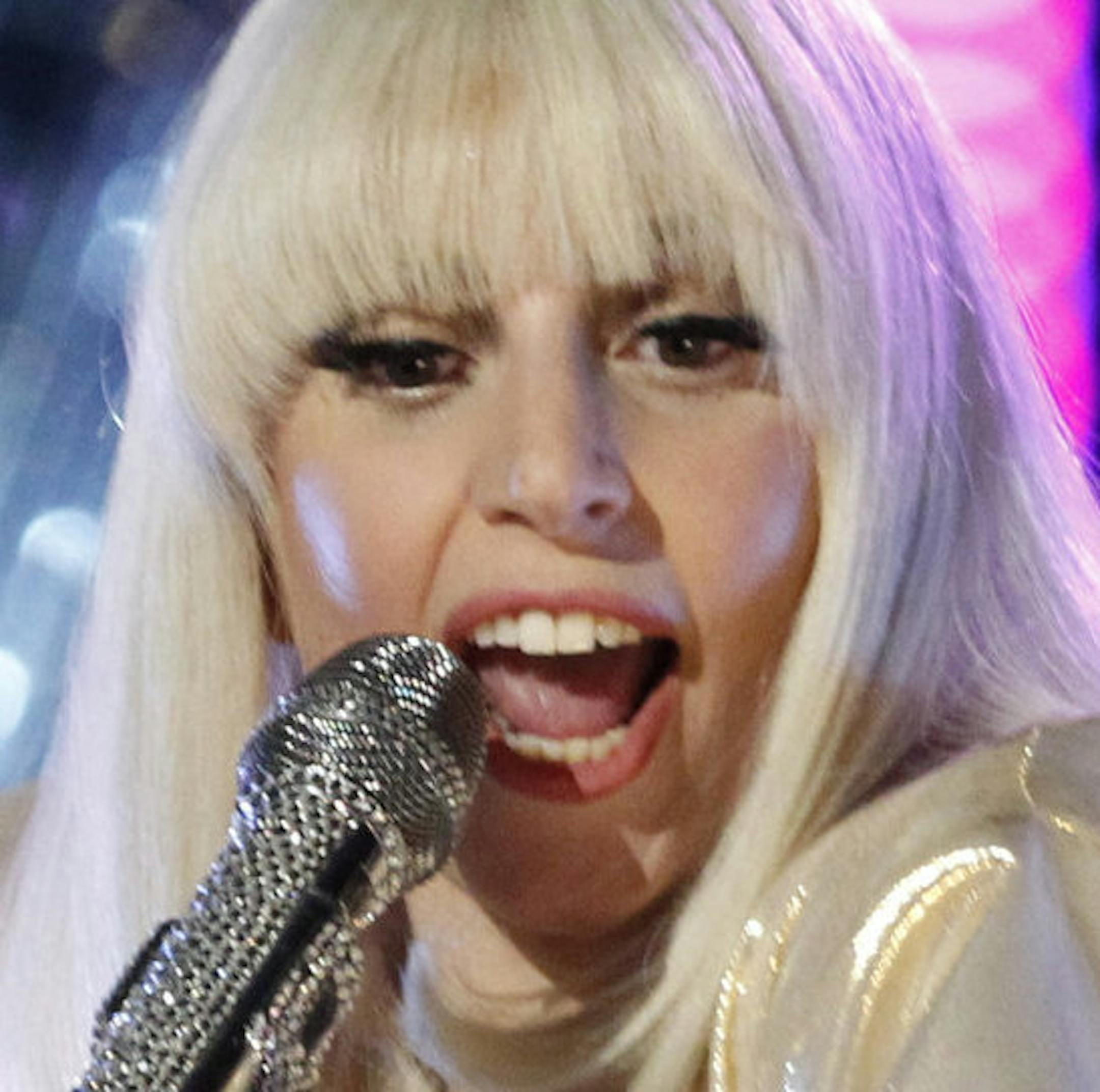 FILE - In this Dec. 17, 2013 file photo provided by NBC, Lady Gaga performs during the season five finale of ìThe Voiceî in Los Angeles. A federal judge has dismissed a copyright lawsuit against Lady Gaga filed by a Chicago songwriter who accused her of stealing parts of one of her songs. Rebecca Francescatti filed the suit in U.S. District Court in Chicago in 2011, alleging that Lady Gaga had copied music and the title lyric from her 1998 song "Juda." Gagaís 2011 song is called "