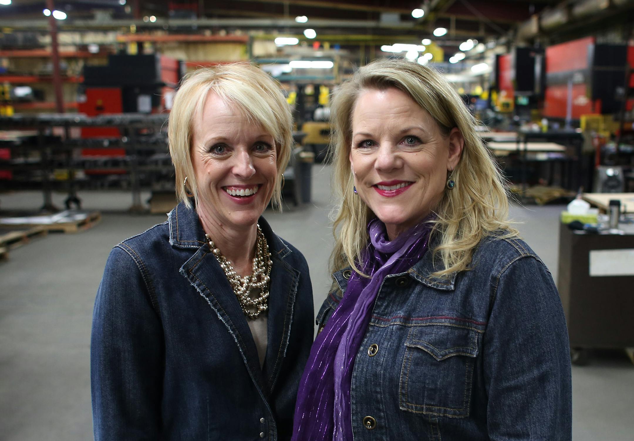Co-owners Traci and Lori Tappani, stood on the work floor of Wyoming Machine. The sisters have been in business for more than 20 years. ] (KYNDELL HARKNESS/STAR TRIBUNE) kyndell.harkness@startribune.com Wyoming Machine in Stacy, Min., Tuesday, December 9, 2014.