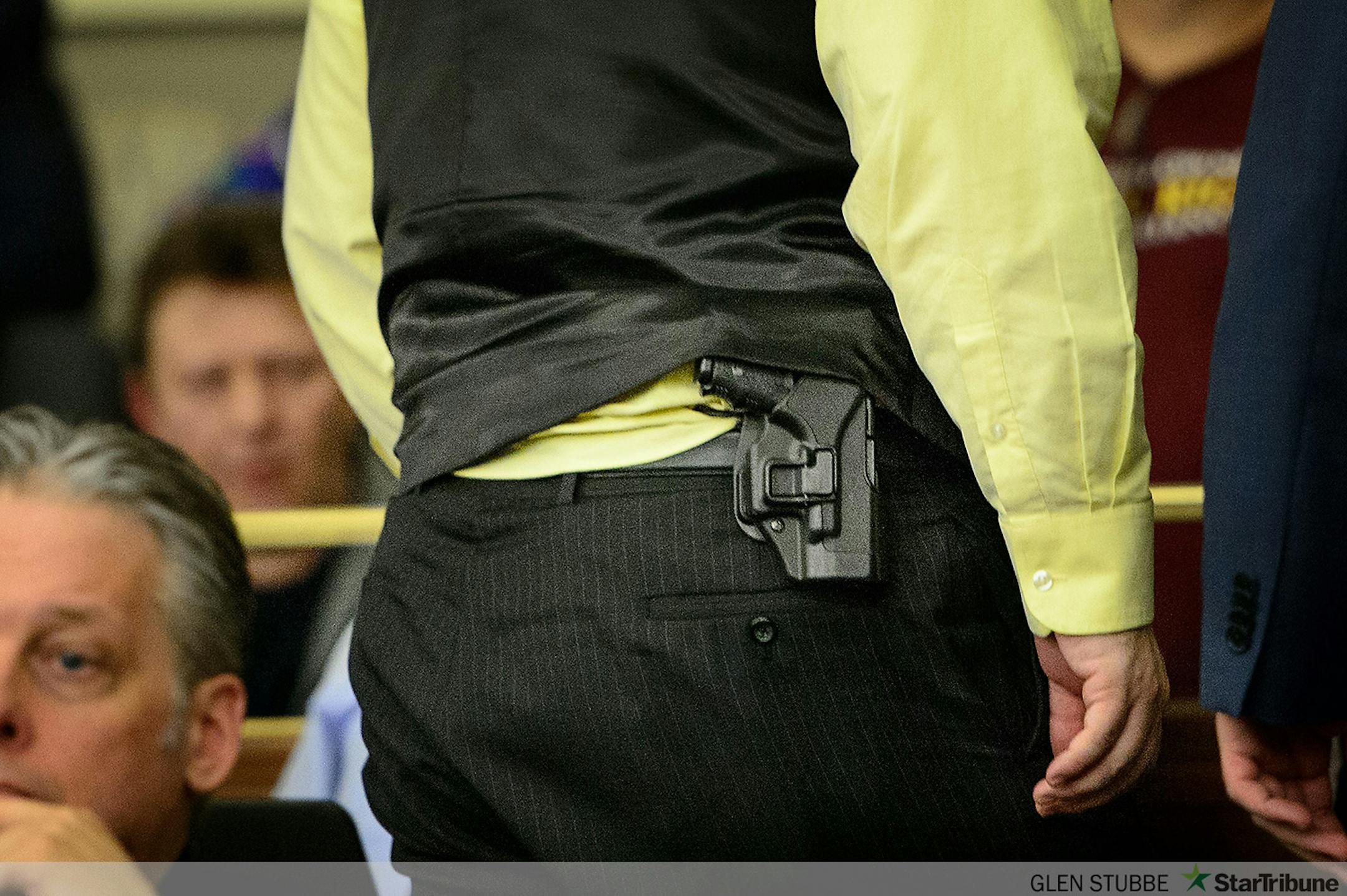 Rep Dan Schoen, DFL-Cottage Grove, is a Cottage Grove police officer and regularly wears his service weapon to the Capitol.  He is on the House Public Safety committee which heard a bill Thursday that would allow suppressors or silencers on guns in Minnesota.    ] GLEN STUBBE * gstubbe@startribune.com  Thursday, March 12, 2015