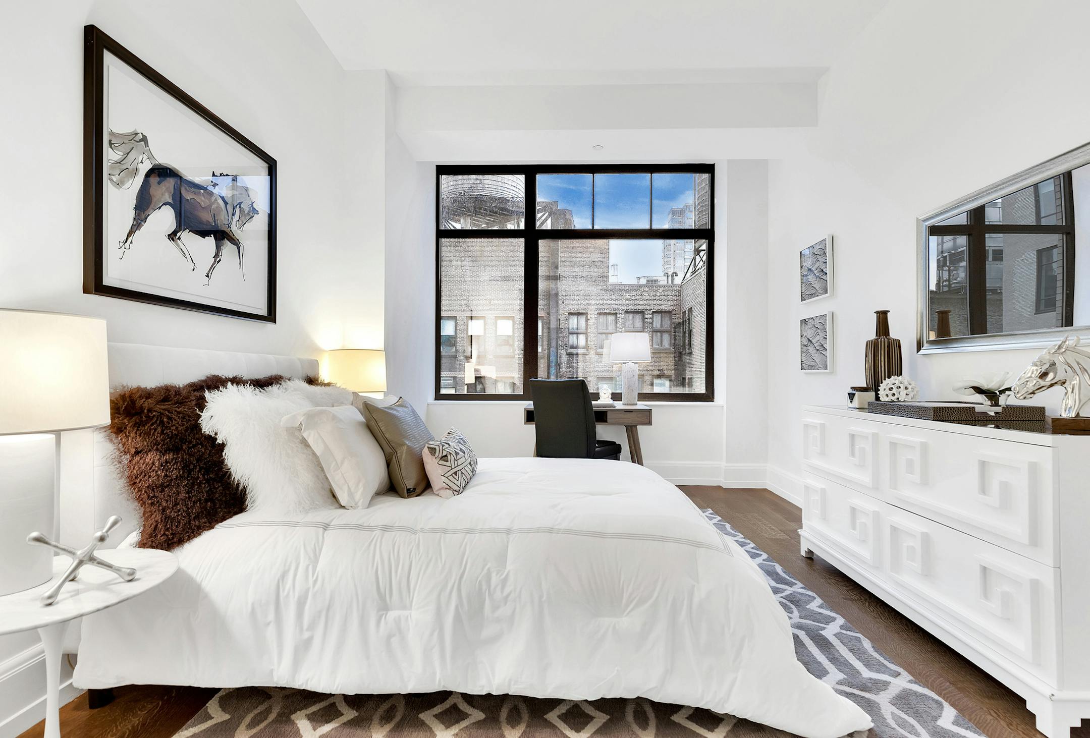 A high contrast color palette of white and chocolate with hints of pale pink makes this young adult space feel more sophisticated.