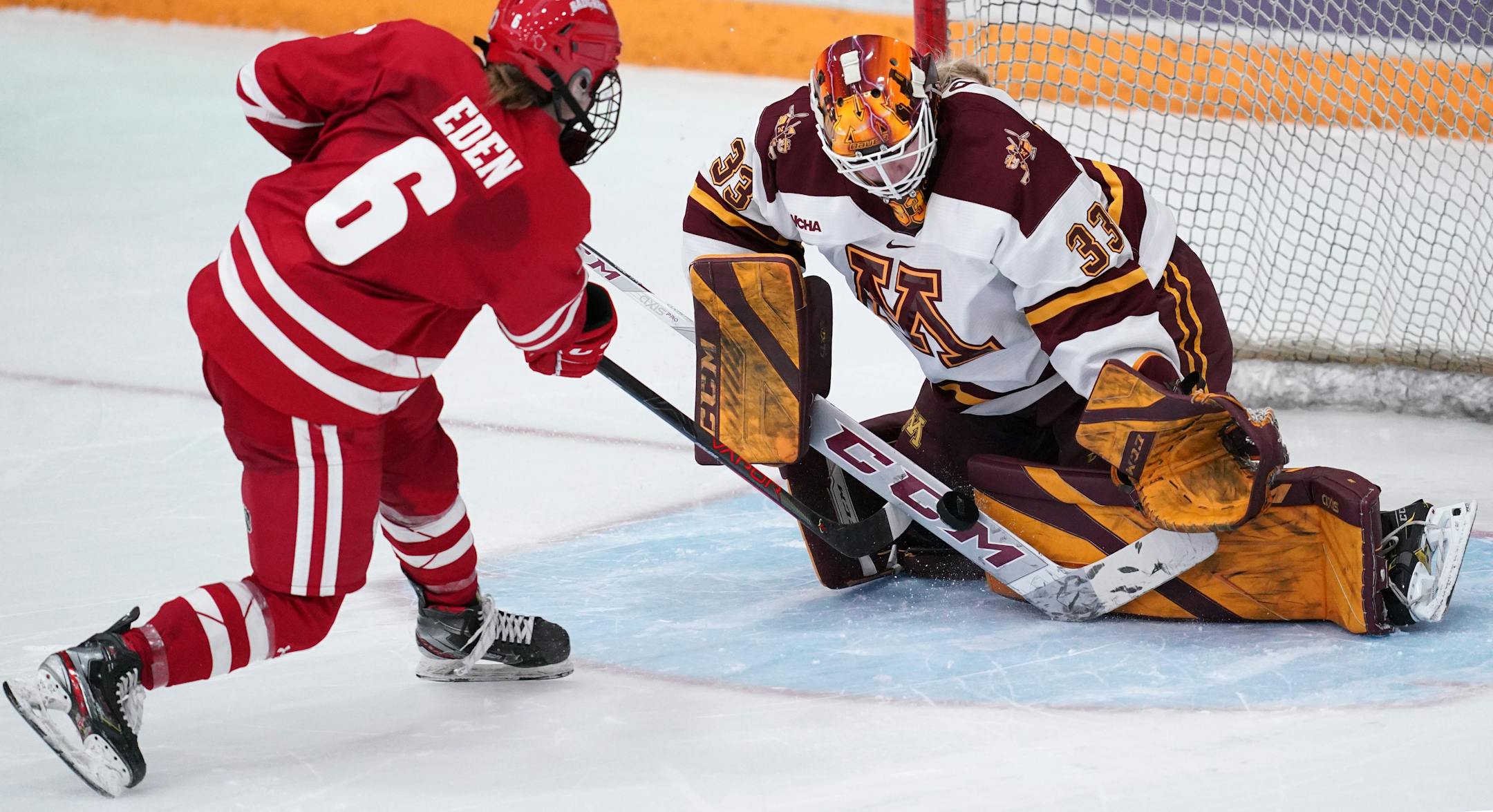 Minnesota goaltender Makayla Pahl (33) stopped a shot from Wisconsin forward Lacey Eden (6) during a game deciding three-person shootout. ] ANTHONY SOUFFLE • anthony.souffle@startribune.com