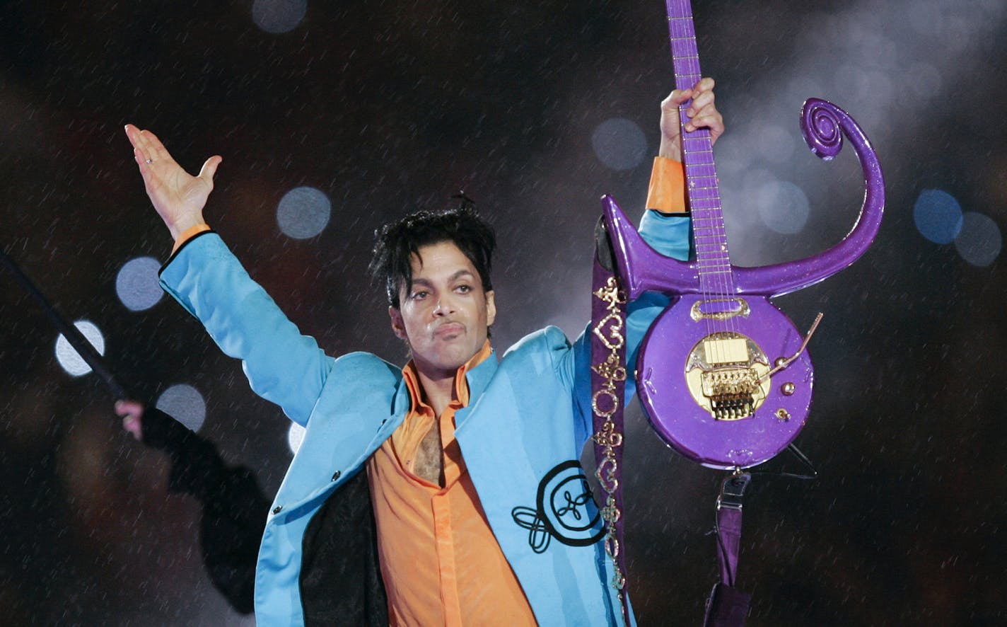 In this Feb. 4, 2007 file photo, Prince performs during the halftime show of Super Bowl XLI.