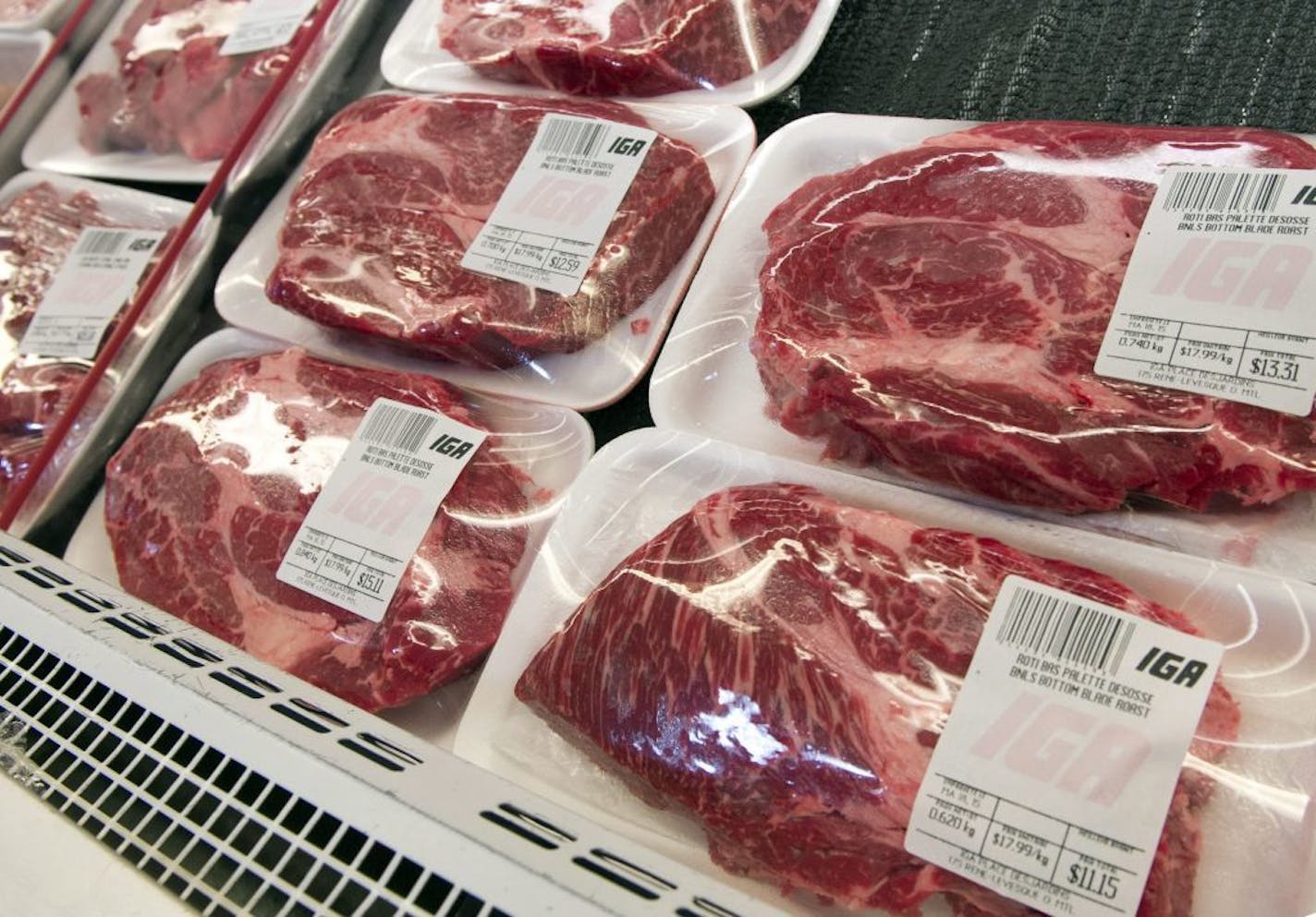 Packaged meat is seen at a grocery store Tuesday, May 19, 2015, in Montreal. Agriculture Minister Gerry Ritz says Canada and Mexico will ask the World Trade Organization to authorize retaliatory measures against the United States over that country's meat-labelling rules. The WTO on Monday ruled against U.S. labels on certain cuts of red meat that say where the animals were born, raised and slaughtered, saying the labels put Canadian and Mexican livestock at a disadvantage. The ruling on meat lab