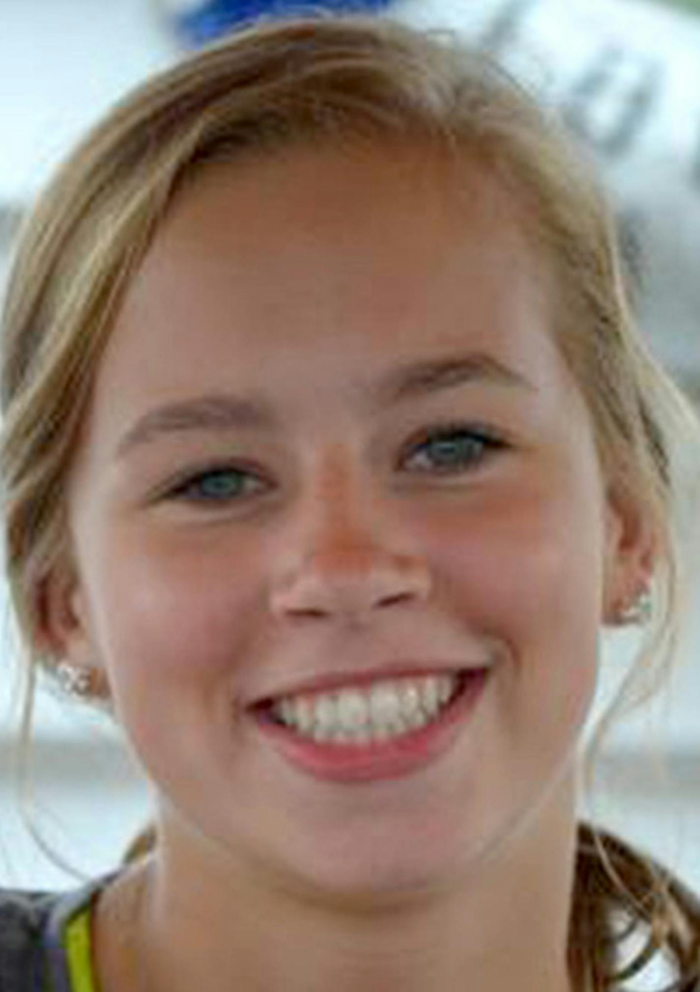 Caption: Eden Prairie's lacrosse team donned blue ribbons in tribute to fellow student-athlete Sydney Galleger, who died after suffering cardiac arrestn while undergoing a dental proceedure,- ( then won the state title Saturday).