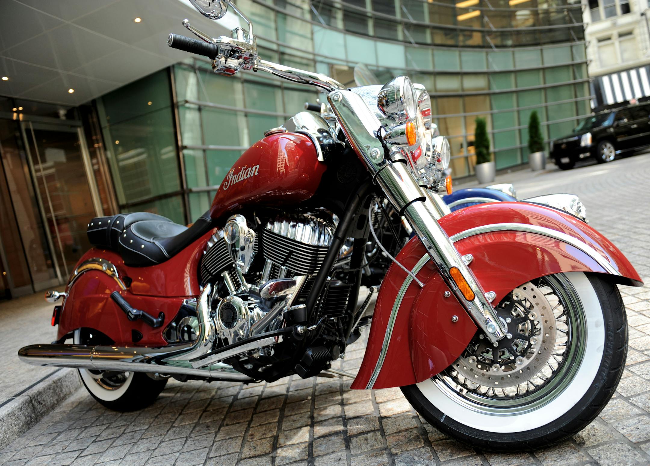 The new line of Indian Motorcycle Co. 2014 Indian Chief motorcycles are displayed for a photograph in New York, U.S., on Monday, Aug. 5, 2013. Indian Motorcycle Co., a subsidiary of Polaris Industries Inc., announced today the details for the new 2014 Indian Chief family of motorcycles. Photographer: Peter Foley/Bloomberg