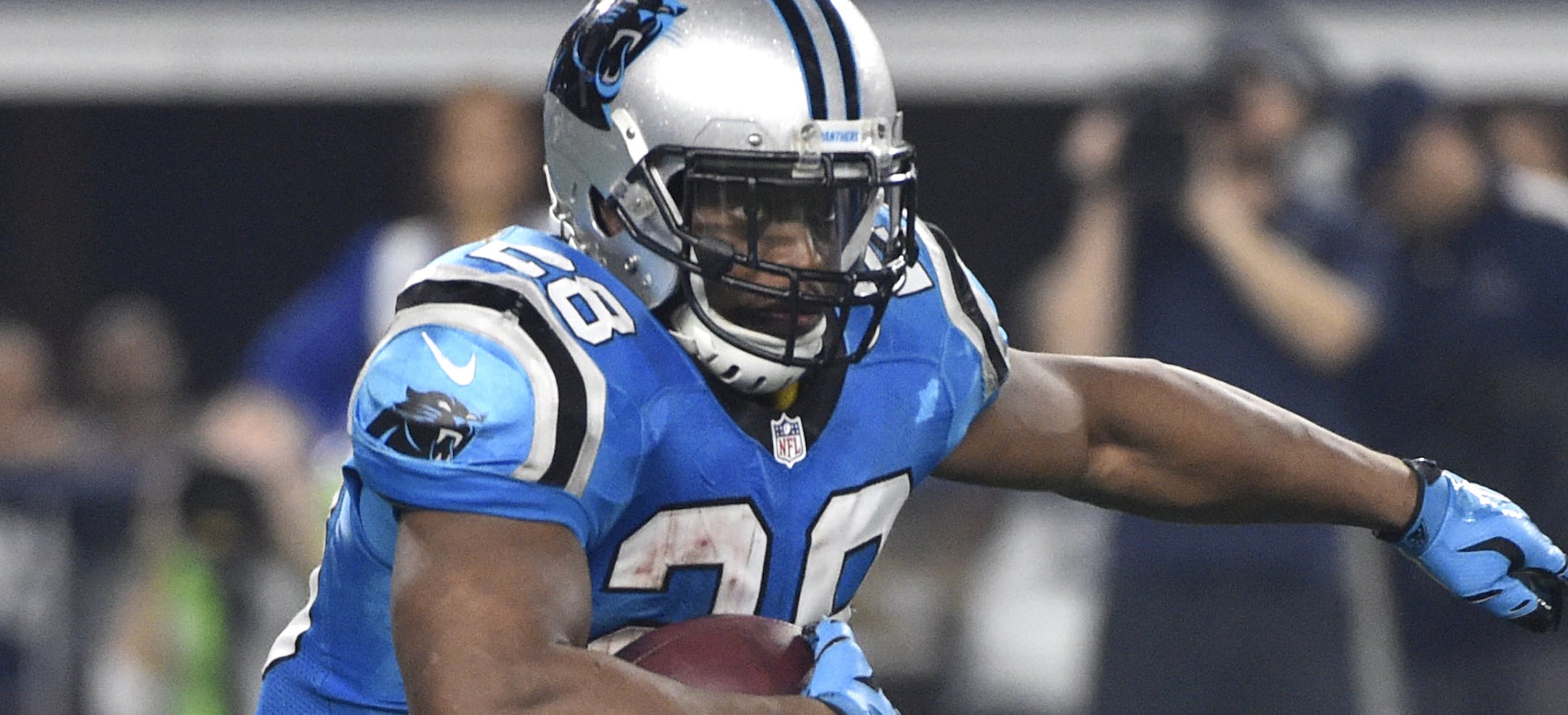 Carolina Panthers running back Jonathan Stewart (28) carries the ball against the Dallas Cowboys in an NFL football game, Thursday, Nov. 26, 2015, in Arlington, Texas. (AP Photo/Michael Ainsworth)