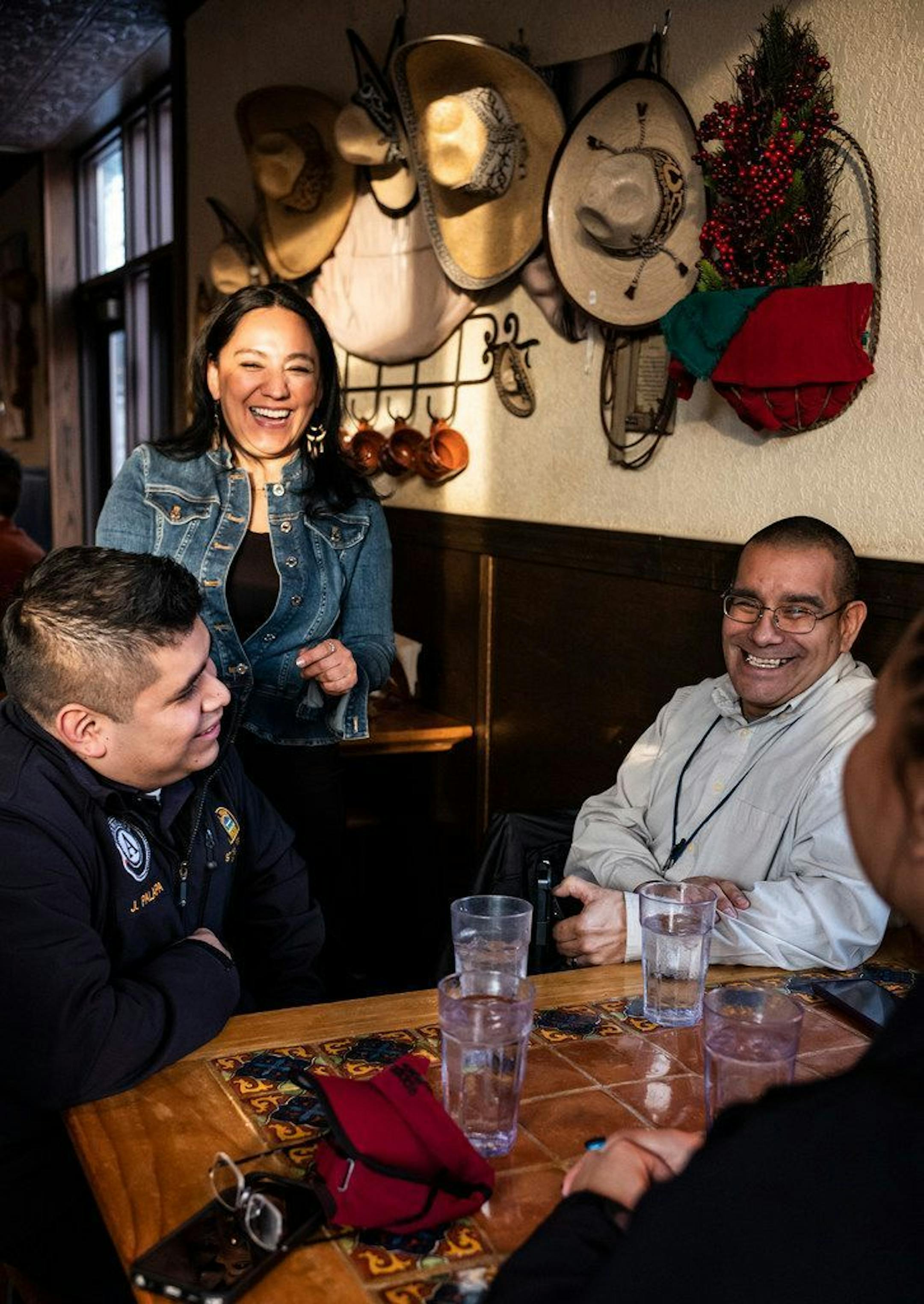 Part owner Milissa Silva-Diaz thanked people for coming out to support Burrito Mercado, including Enrique Estrada who brought out his mentees in the Law Enforcement Path Academy. Silva-Diaz said the staff was doing better after the traumatic robbery. Community members hold gathering in support of St. Paul's Burrito Mercado after a takeover style robbery in January. RICHARD TSONG-TAATARII