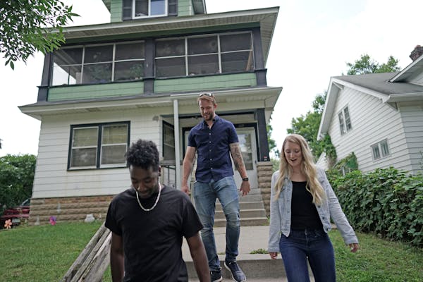 Ben Peters showed Brianna and Thomas Williams a triplex in St. Paul’s North End in August 2019.