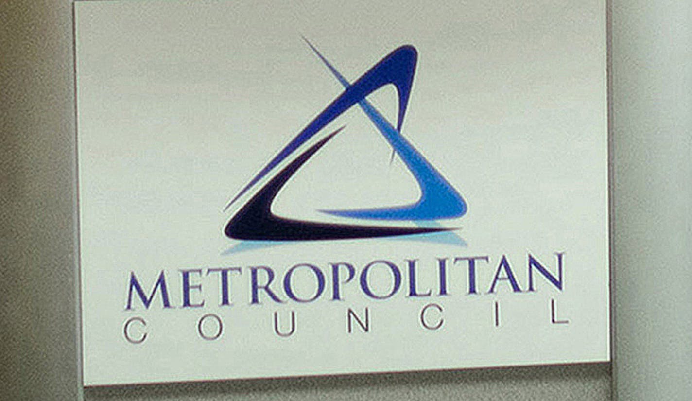 New Met Council Chair Adam Duininck held a news conference at the Metropolitan Council headquarters to address cost overruns of the Southwest metro light rail. ] GLEN STUBBE * gstubbe@startribune.com Monday, April 27, 2015 Cost overruns that put the Southwest metro light-rail line at nearly $2 billion are threatening the project and putting new Met Council Chair Adam Duininck in the hot seat. Duininck's confirmation hearing, coincidentally set for today ORG XMIT: MIN1504271525271134 ORG XMIT: MI