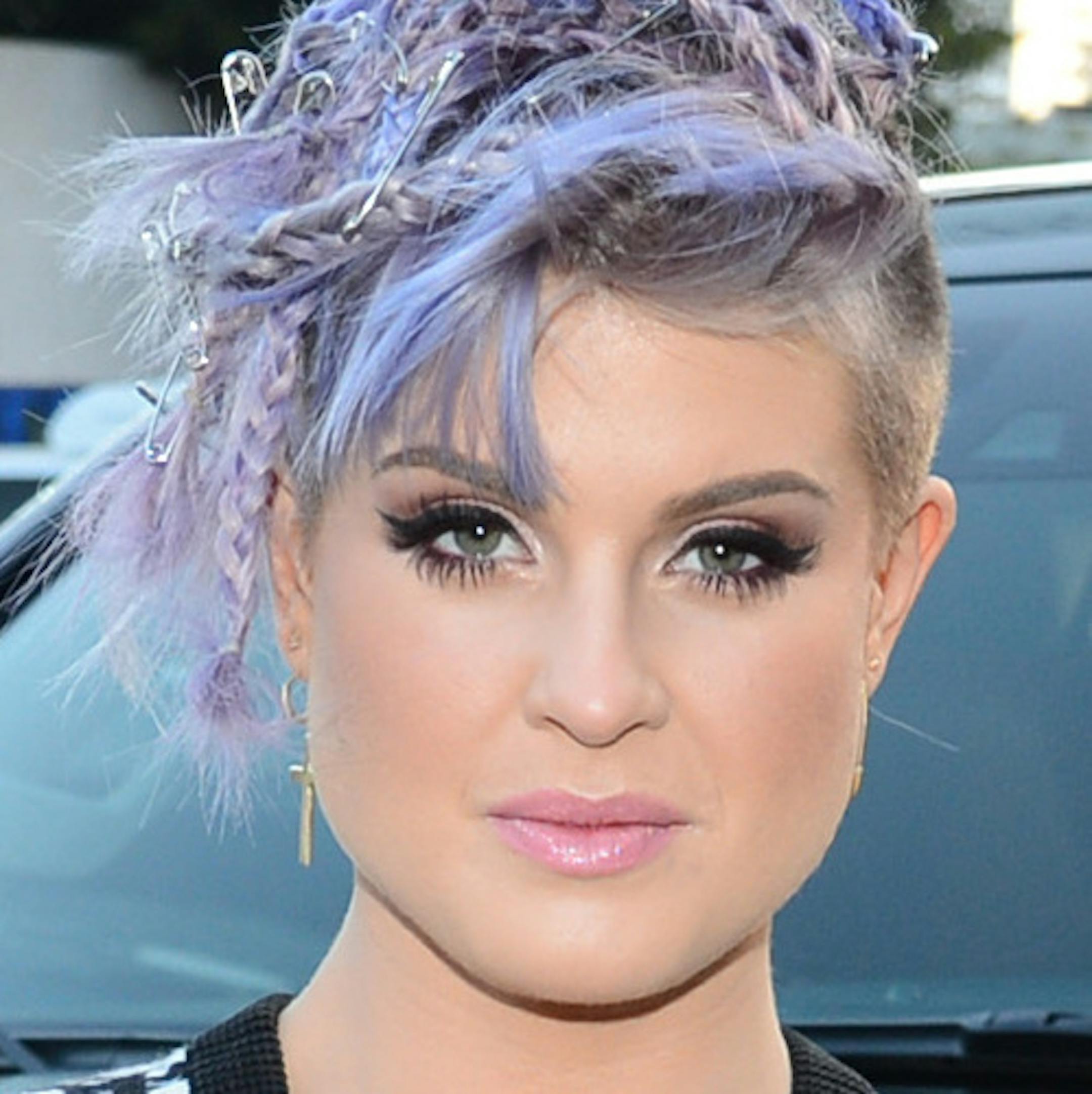 IMAGE DISTRIBUTED FOR CADILLAC - Host Kelly Osbourne with the all-new 2015 Cadillac Escalade at the Cadillac & Refinery29 Present Driven by Digital: Leaders in Style + Tech event at HYDE Sunset Kitchen + Cocktails in Los Angeles on June 19, 2014. (Photo by Jordan Strauss/Invision for Cadillac/AP Images)