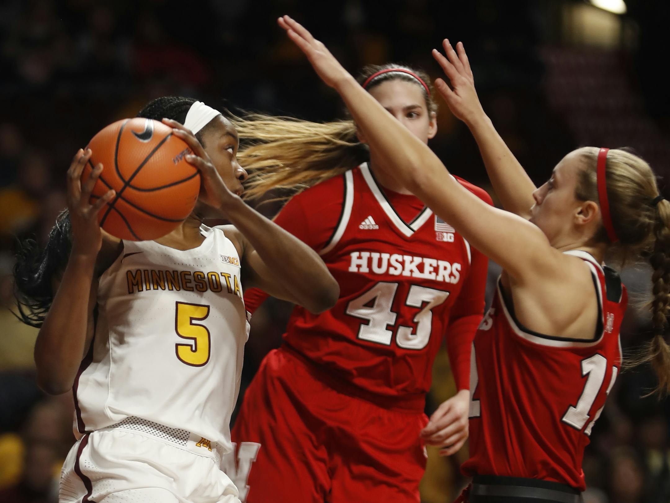 Taiye Bello(5) looks for to pass against Nebraska.]Game coverage of women's basketball from Nebraska vs Gophers at Williams Arena.Richard Tsong-Taatarii&#xef;rtsong-taatarii@startribune.com