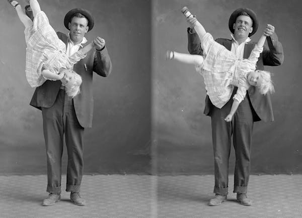 Father in a playful pose with his daughter.�Gust Akerlund | Cokato Museum
