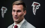 Falcons quarterback Kirk Cousins speaks during a news conference March 13.