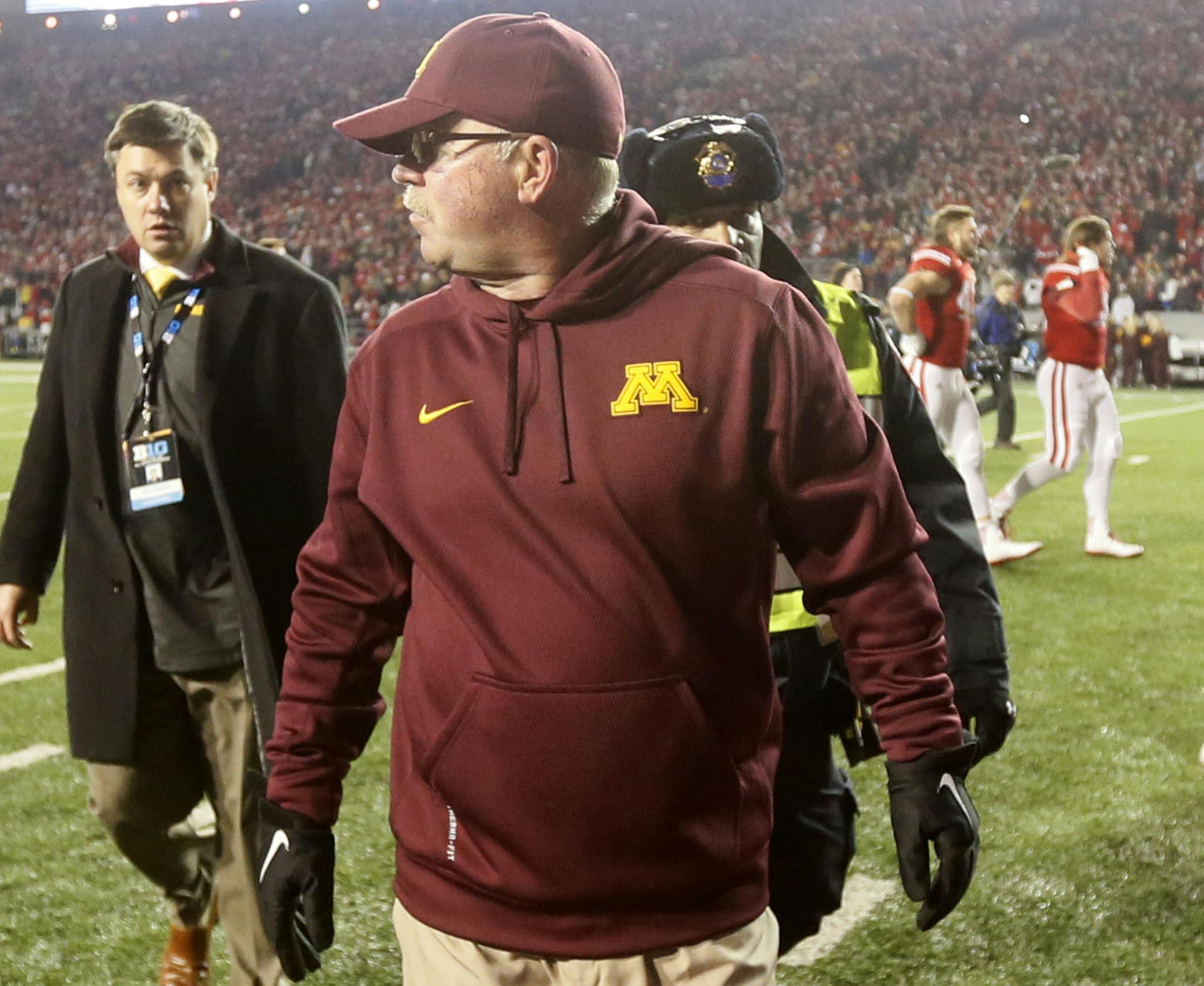 Minnesota coach Jerry Kill waked off the field after the Gophers lost 34-24 Saturday November 29, 2014 in Madison, Wisconsin . ] The University of Minnesota played the Wisconsin Badgers Saturday at Camp Randall Stadium for the right to play for the Big Ten Championship. Jerry Holt Jerry.holt@startribune.com