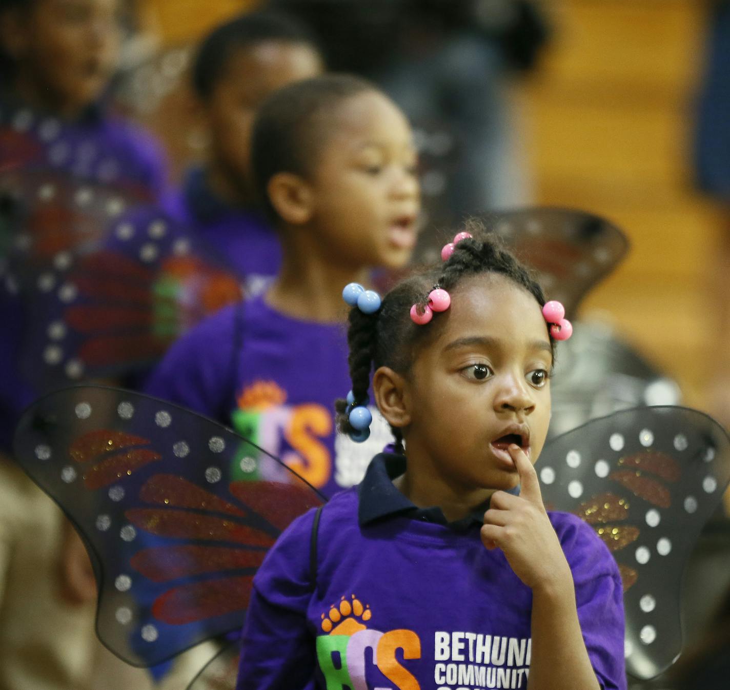 Kinyare Bell a kindergarten at Bethune Elementary School wore butterfly wings as she and her classmates performed during a talent assembly Monday May 18, 2015 in Minneapolis, MN. Sarah Jessica Parker attended an assembly at Bethune as part of the Turnaround Arts, a signature program of the President Committee on the Arts and the Humanities, run in Minnesota by the Perpich Center for Arts Education. ] Jerry Holt/ Jerry.Holt@Startribune.com