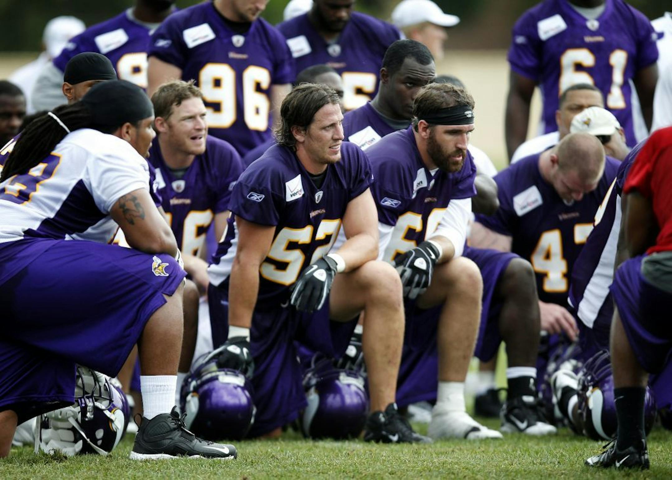 Vikings players including Chad Greenway (52) and Jared Allen (69) huddled up to listen to head coach Leslie Frazier at the end of practice on Tuesday.