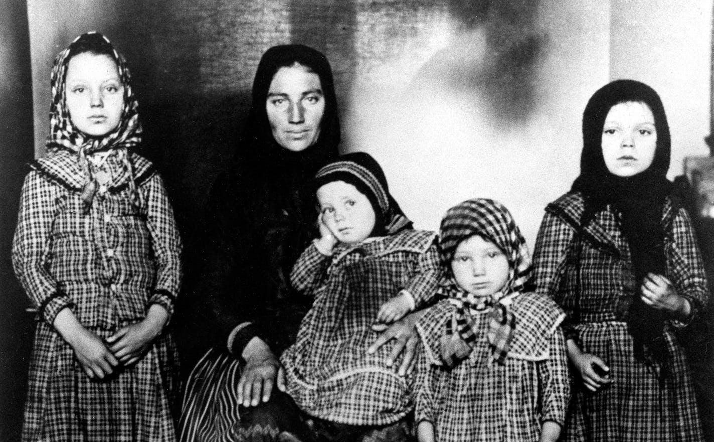 Immigrants from Eastern Europe arrive in New York City, circa 1909. Associated Press