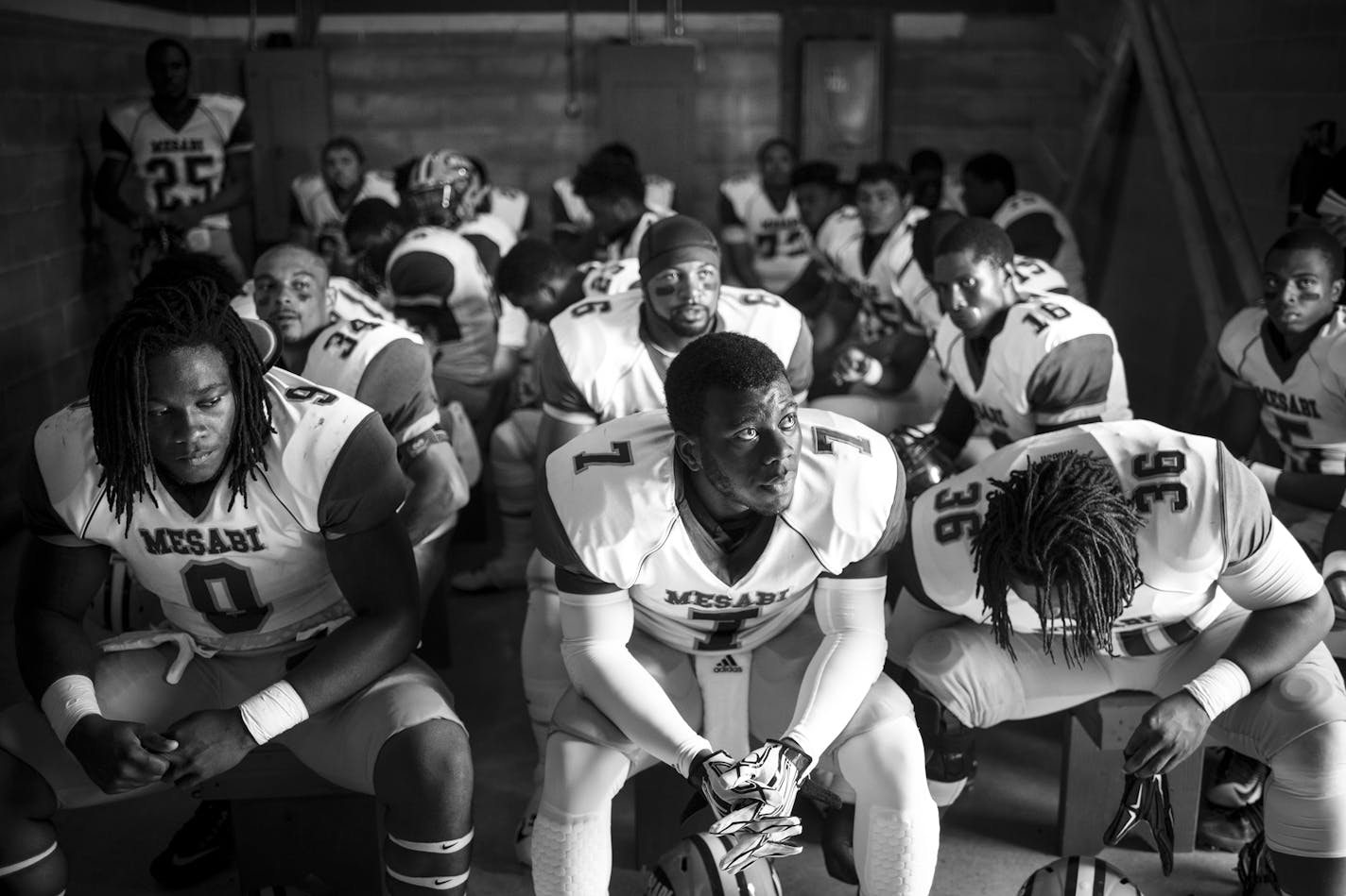 Mesabi Range players including, from left, Elvin Turner, Andre Bell and Kalil Grice, sat in the visiting team locker room moments before their season kicked off against Ridgewater in Willmar in late August. ] Aaron Lavinsky � aaron.lavinsky@startribune.com Photos to accompany a story on the Mesabi Range College Football team in Virginia, Minnesota. The team, which consists mostly of black athletes recruited from around the country, struggles to find its place in mostly-white mining country on th