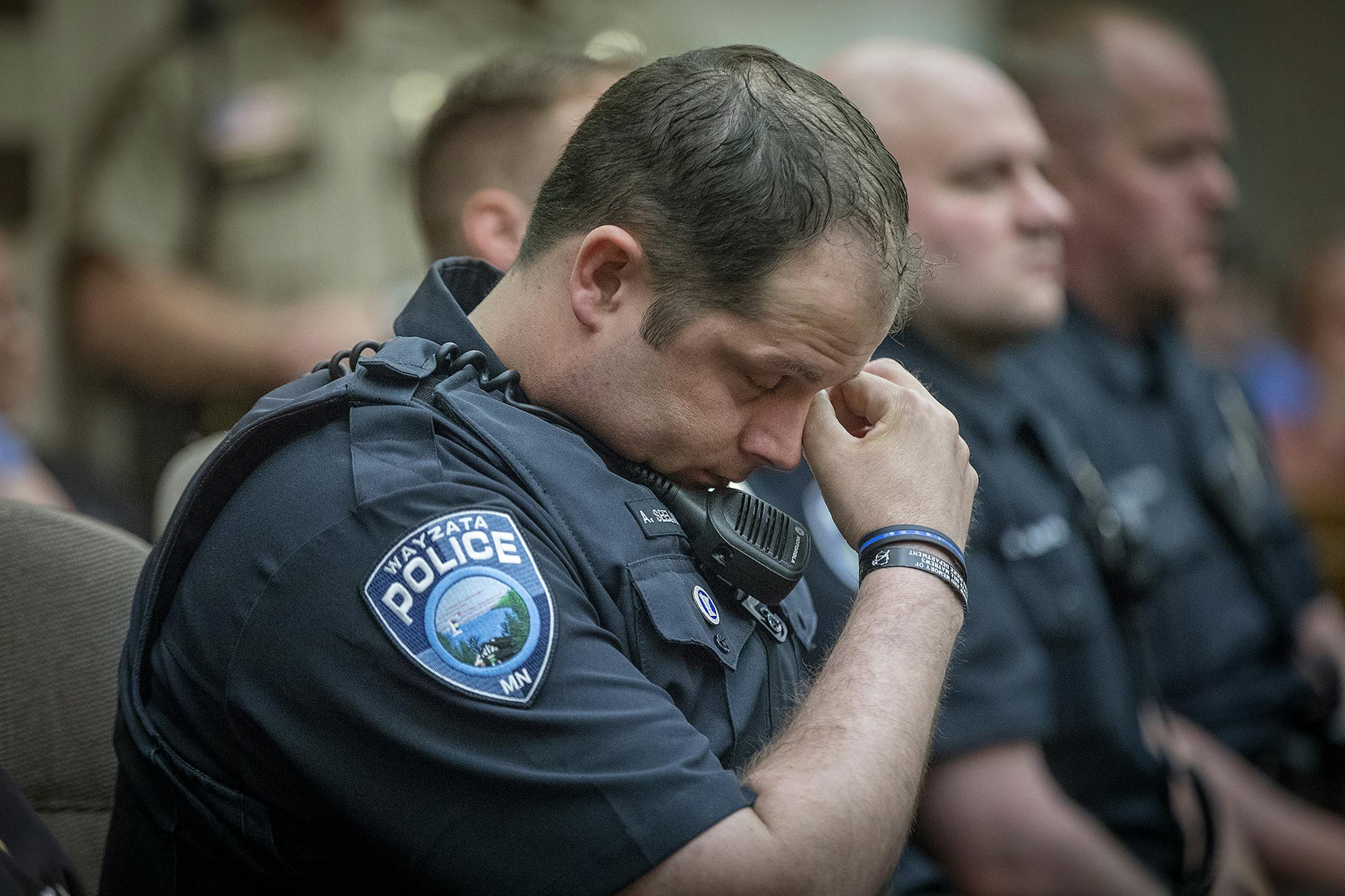 Wayzata Police officers listened from the jurors box after Wayzata Police Officer William Mathews's son gave a statement before Beth Freeman was sentenced to 98 months in prison by Judge Tamara Garcia in a Hennepin District Courtroom for a driving accident that killed him while she was on cocaine and on probation for a drug related crime, Friday, May 11, 2018. Next to Freeman was her attorney Andrea Ryan Anderson. ] ELIZABETH FLORES ï liz.flores@startribune.com