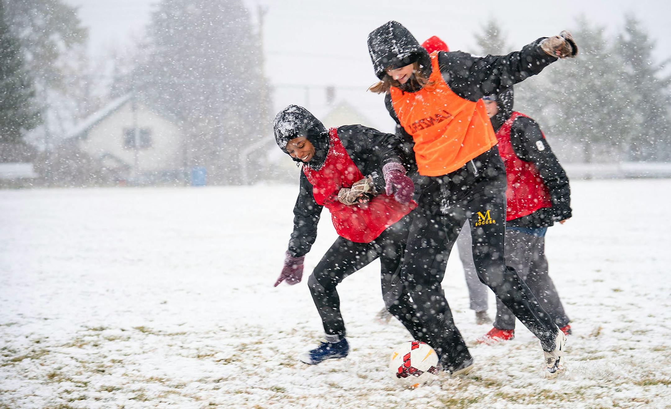 The Marshall School girl's soccer team practiced during an early season snow storm on Tuesday afternoon in Duluth.