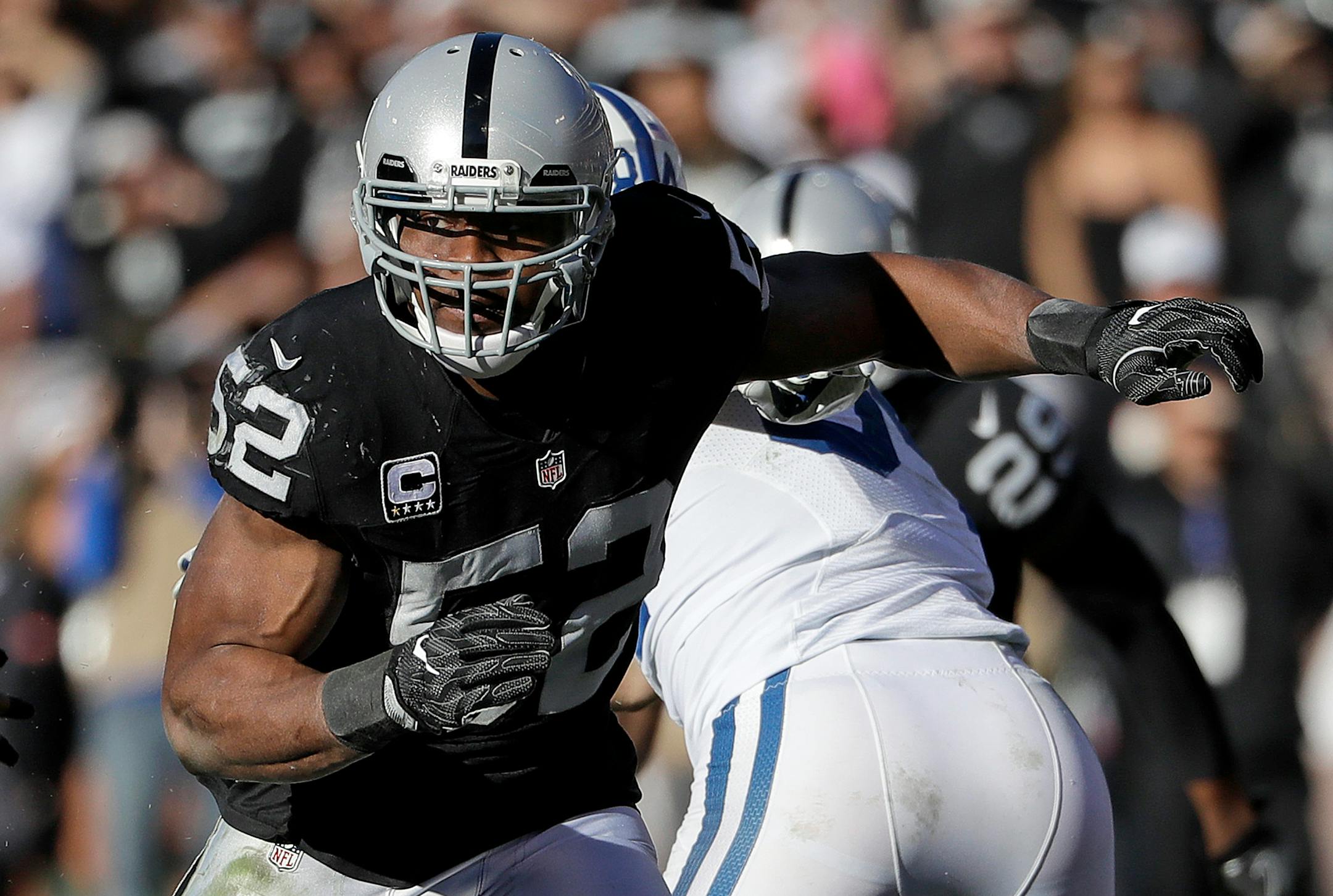 Defensive end Khalil Mack is headed to the Chicago Bears.