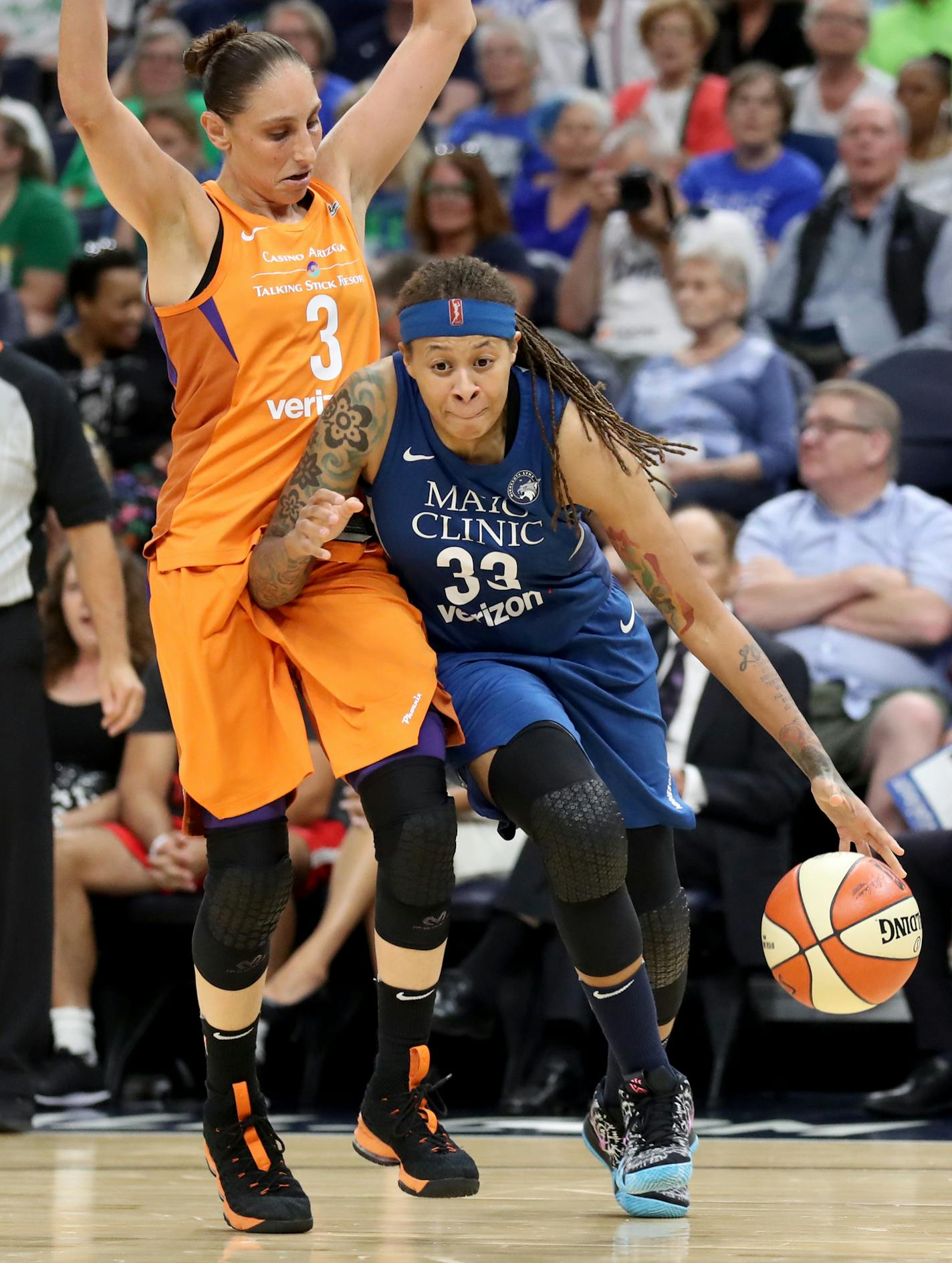 The Minnesota Lynx Seimone Augustus (33) dribbles by the Phoenix Mercury's Diana Taurasi (3) during the first quarter Friday, June 1, 2018, at the Target Center in Minneapolis, MN.] DAVID JOLES &#xef; david.joles@startribune.com Phoenix Mercury at the Minnesota Lynx