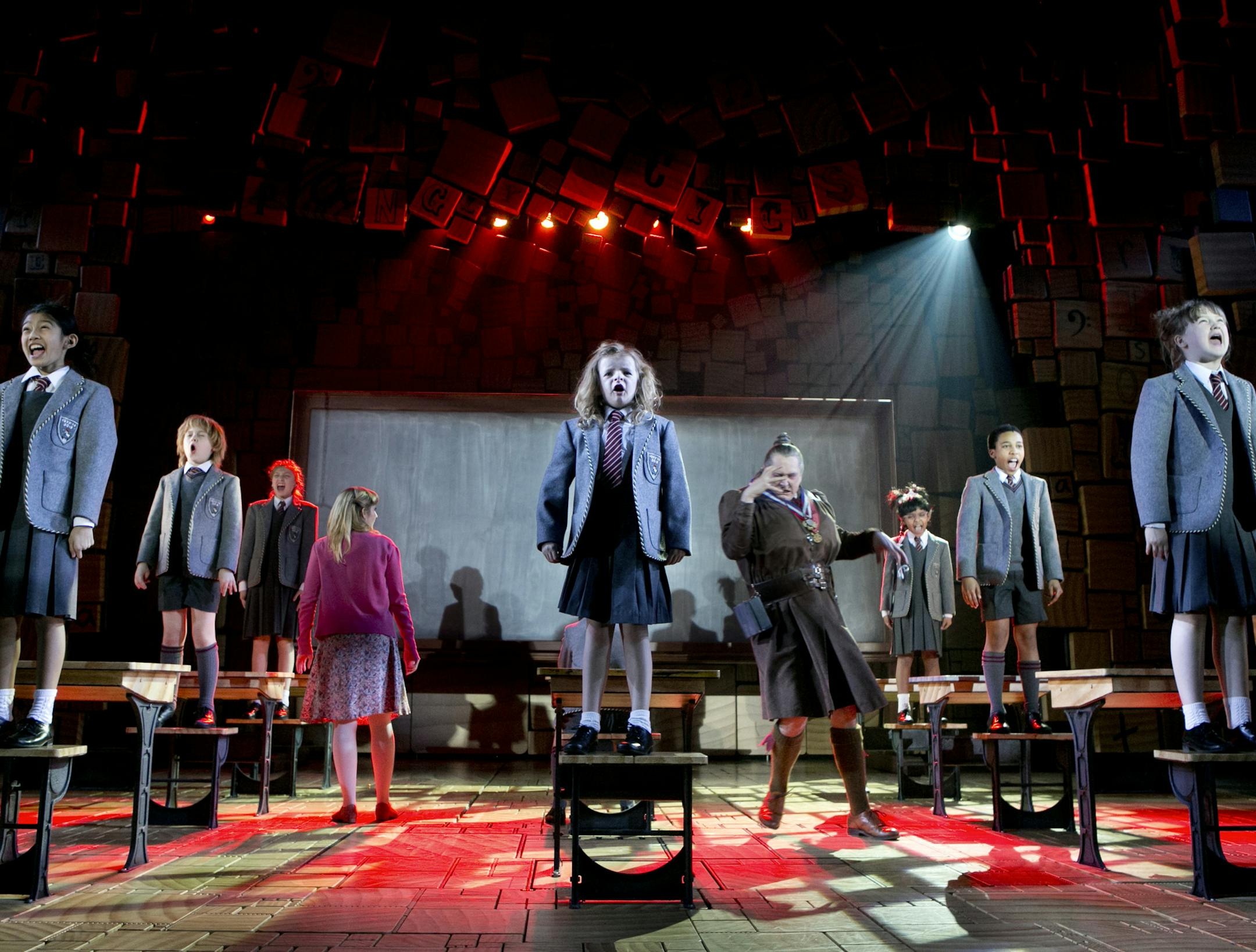 FILE -- Milly Shapiro, center, as the title character in the musical "Matilda" at the Shubert Theatre in New York, March 2, 2013. The production, created in England and based on a Roald Dahl children's novel, had 12 nominations for the 67th annual Tony Awards, including best musical. (Sara Krulwich/The New York Times)