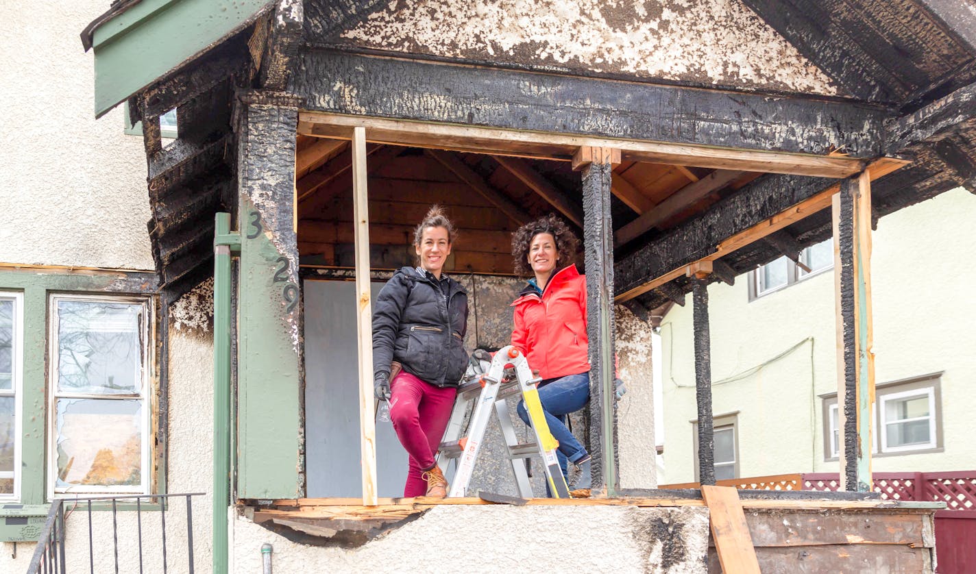 Emergency restoration experts and sisters Kirsten and Lindsey survey the fire-damaged porch at this Minneapolis home owned by the Williams as seen on Renovation 911.