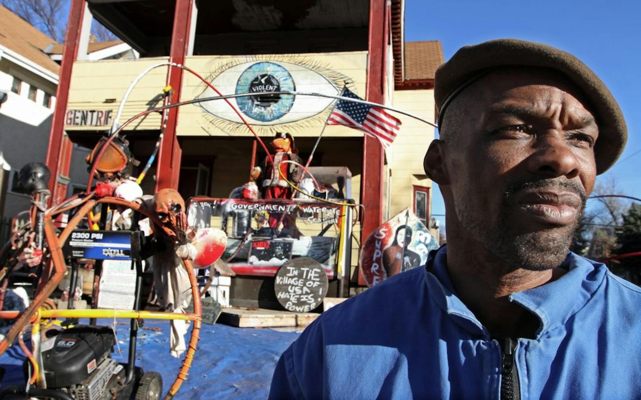 Andrew Moore has built an anti-government shrine on the front lawn of his Phillips neighborhood duplex and has had a series of run-ins with Minneapolis housing authorities.