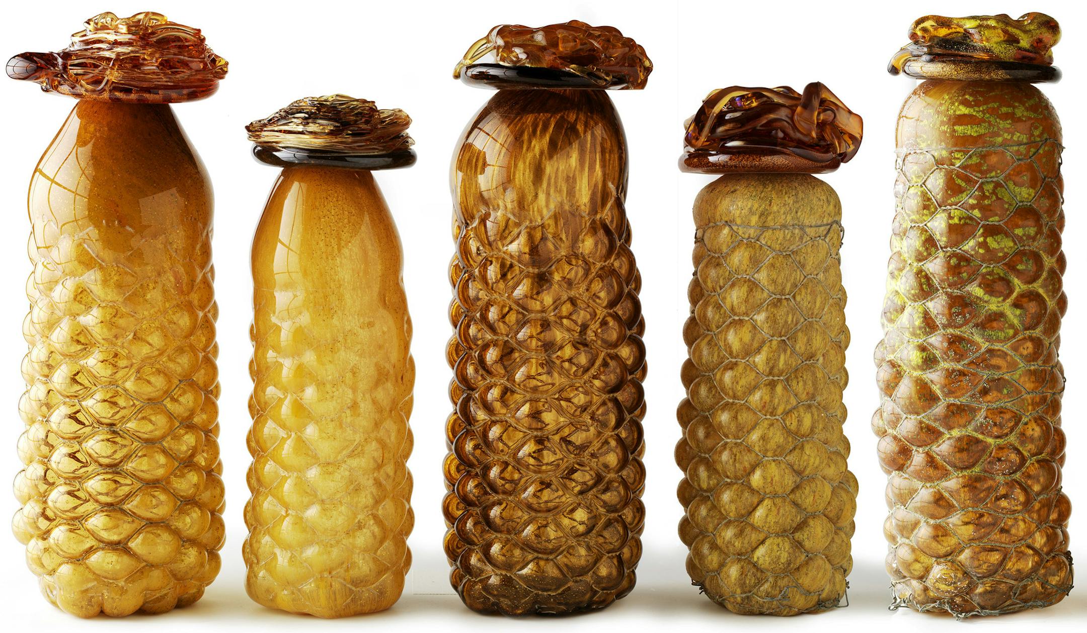 An undated handout photo of Judi Harvest's Murano glass jars that evoke her exercise in beekeeping. Equipped with new technologies, motivated to solve problems of scarcity, obesity and waste, and encouraged by rocketing culinary enthusiasms, designers are recalibrating our ideas of taste while preparing science-fiction scenarios for our kitchens. (Matthew Klein via The New York Times) -- NO SALES; FOR EDITORIAL USE ONLY WITH STORY SLUGGED FOOD DESIGN. ALL OTHER USE PROHIBITED.