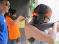Camp-goers learned gun safety at a Forkhorn Camp at Delano Sportsmen Club.