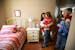 Blake VanderWert showed her daughter Vivian Hootman, 3, her new room for the first time as friends and family members toured VanderWert's remodeled ho