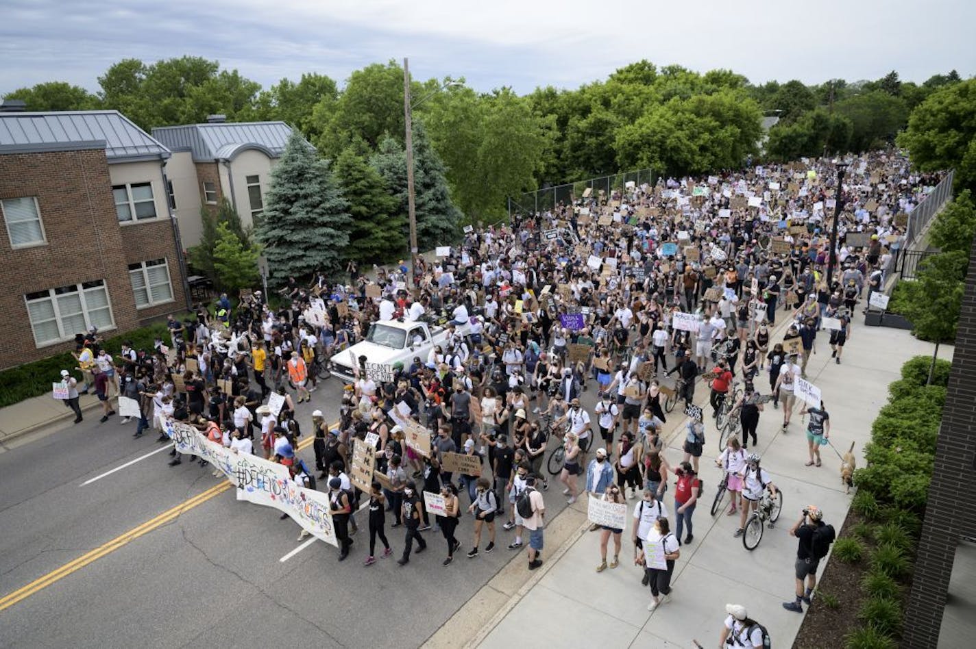 Thousands of protesters marched down University toward Minneapolis Mayor Jacob Frey's home in Northeast Minneapolis.