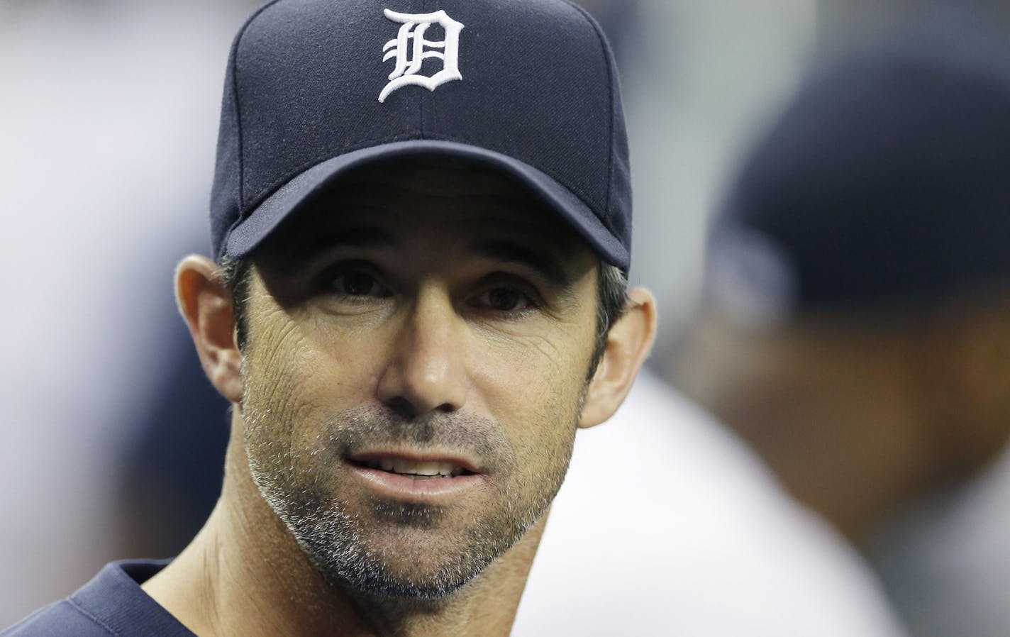 Detroit Tigers manager Brad Ausmus is seen in the dugout before the first inning of a baseball game against the Kansas City Royals in Detroit, Wednesday, Sept. 10, 2014. (AP Photo/Carlos Osorio) ORG XMIT: otkco123