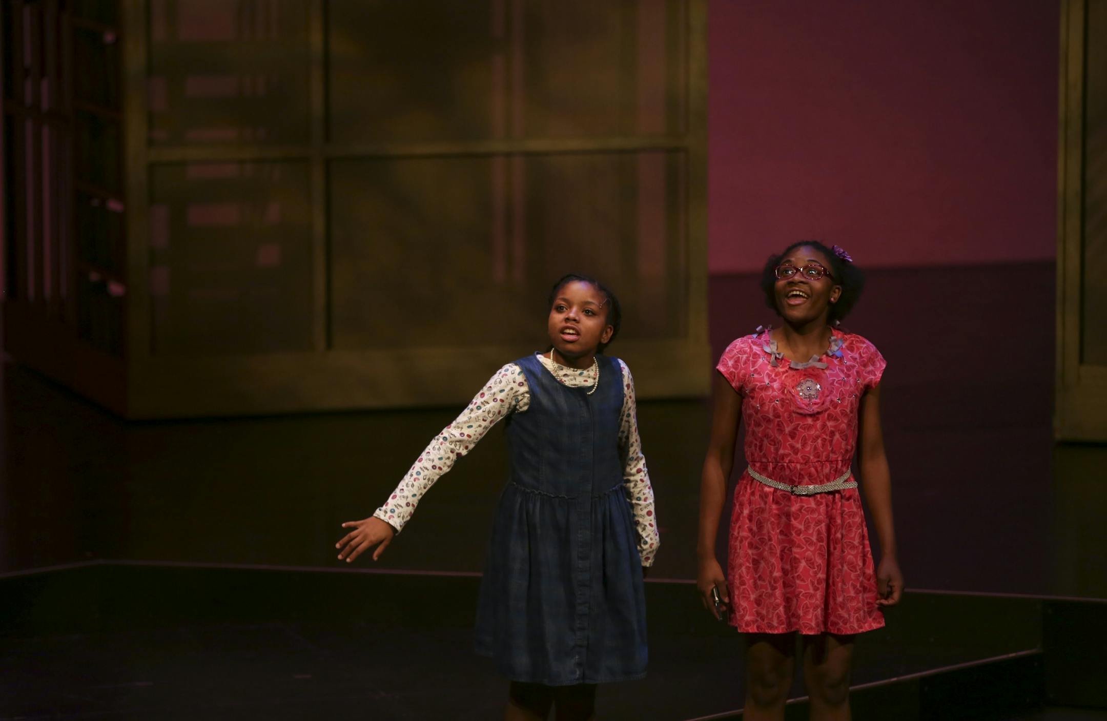 Johannah Easley as Akeelah, left, with Zaria Graham as her friend, Georgia, in a first act scene during rehearsal Sunday night.