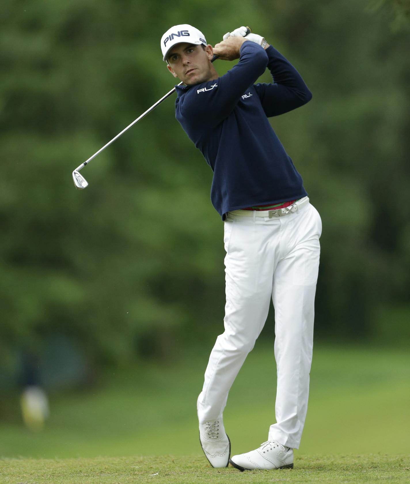 Billy Horschel tees off on the eighth hole during the first round of the U.S. Open golf tournament at Merion Golf Club, Friday, June 14, 2013, in Ardmore, Pa. (AP Photo/Julio Cortez)