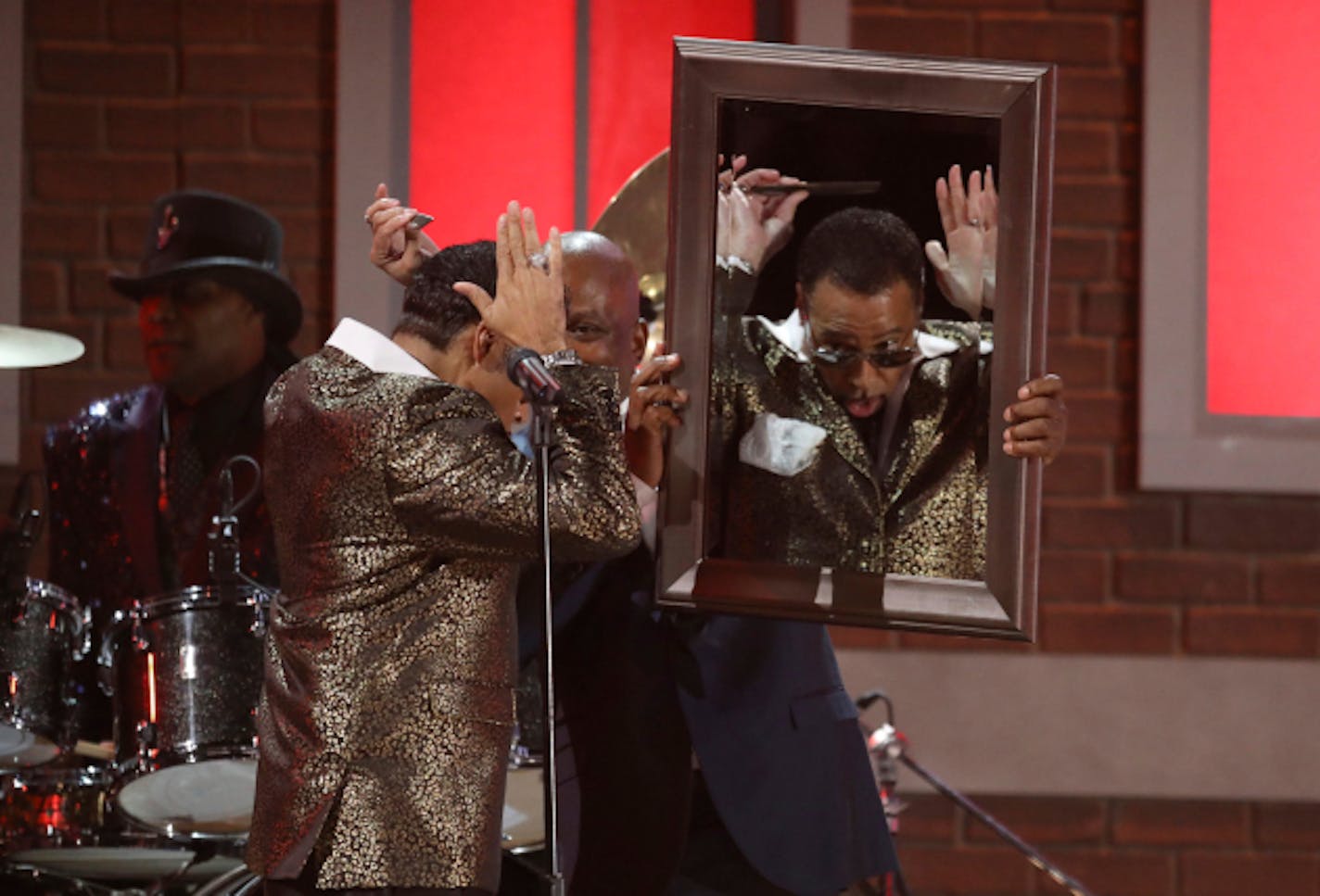 Morris Day of The Time performs a tribute to Prince at the 59th annual Grammy Awards on Sunday, Feb. 12, 2017, in Los Angeles. (Photo by Matt Sayles/Invision/AP)