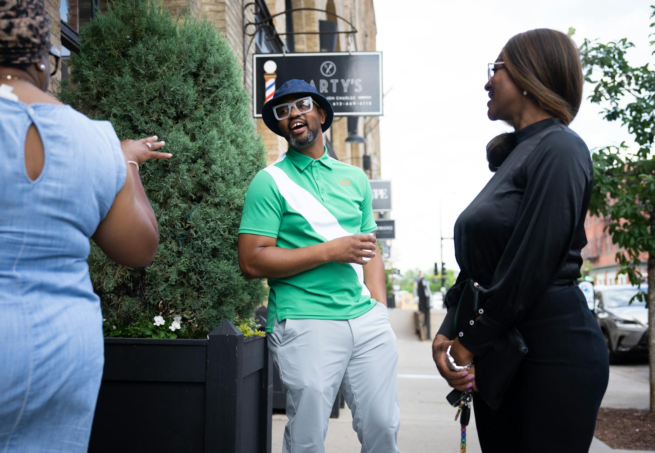 Houston White greets guests arriving at a pop up event at Martin Patrick 3 for White's high-end Viictory sportswear collection in June.