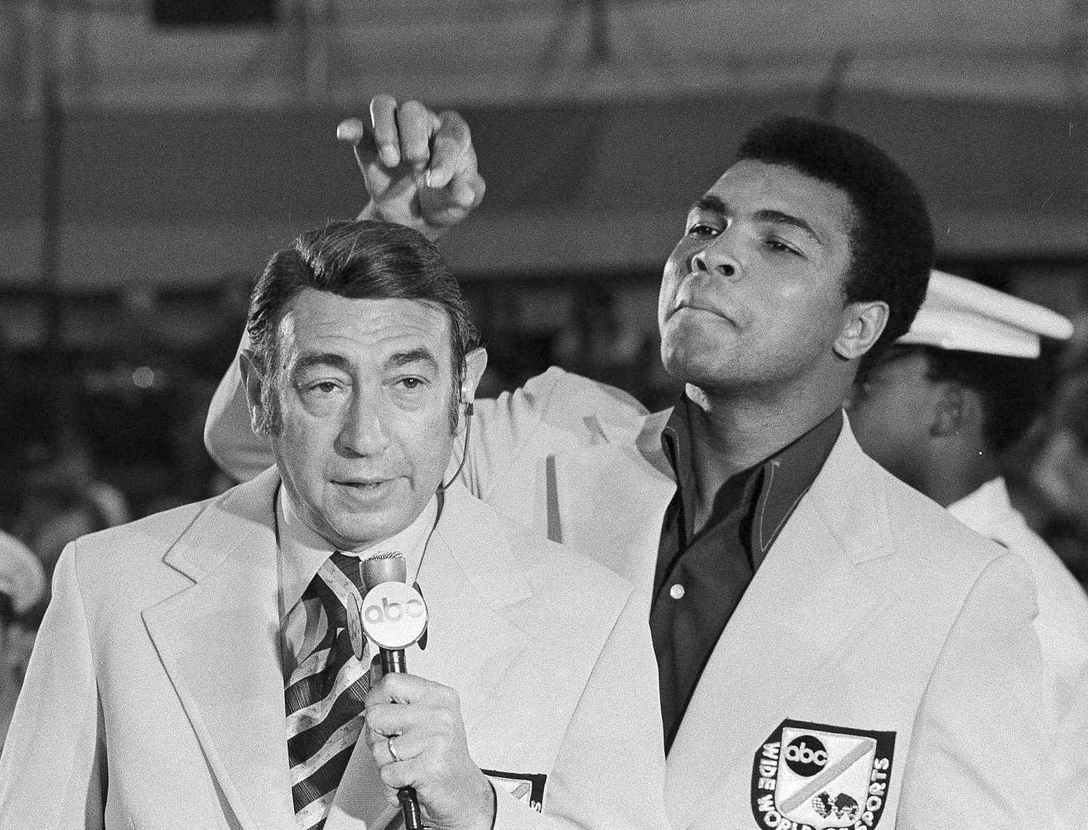 FILE - In this Aug. 7, 1972, file photo, Muhammad Ali jokes with television sports commentator Howard Cosell before the start of the Olympic boxing trials, in West Point, NY. Ali, the magnificent heavyweight champion whose fast fists and irrepressible personality transcended sports and captivated the world, has died according to a statement released by his family Friday, June 3, 2016. He was 74. (AP Photo/File)