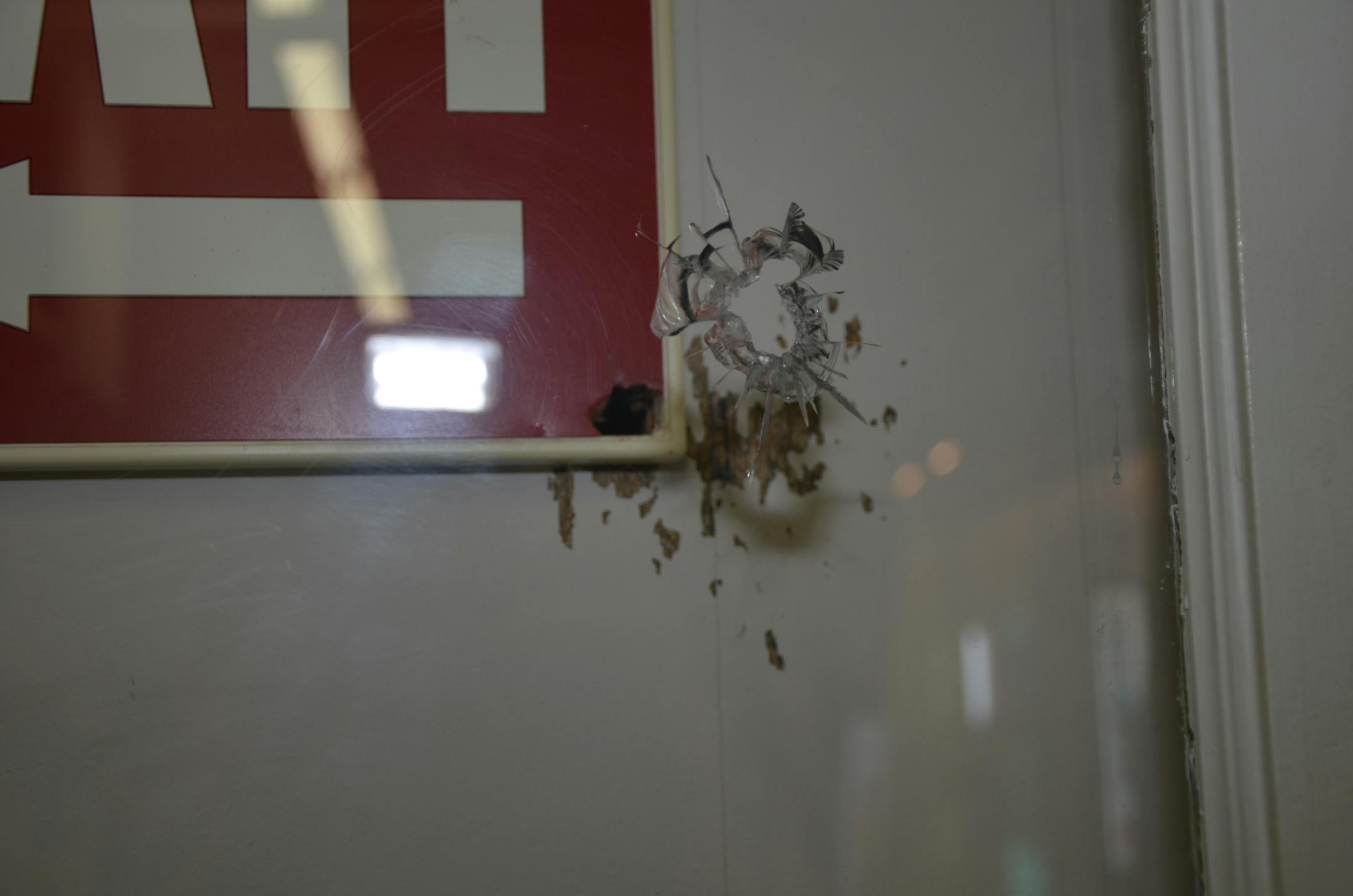 A bullet hole at Accent Signage shooting scene.