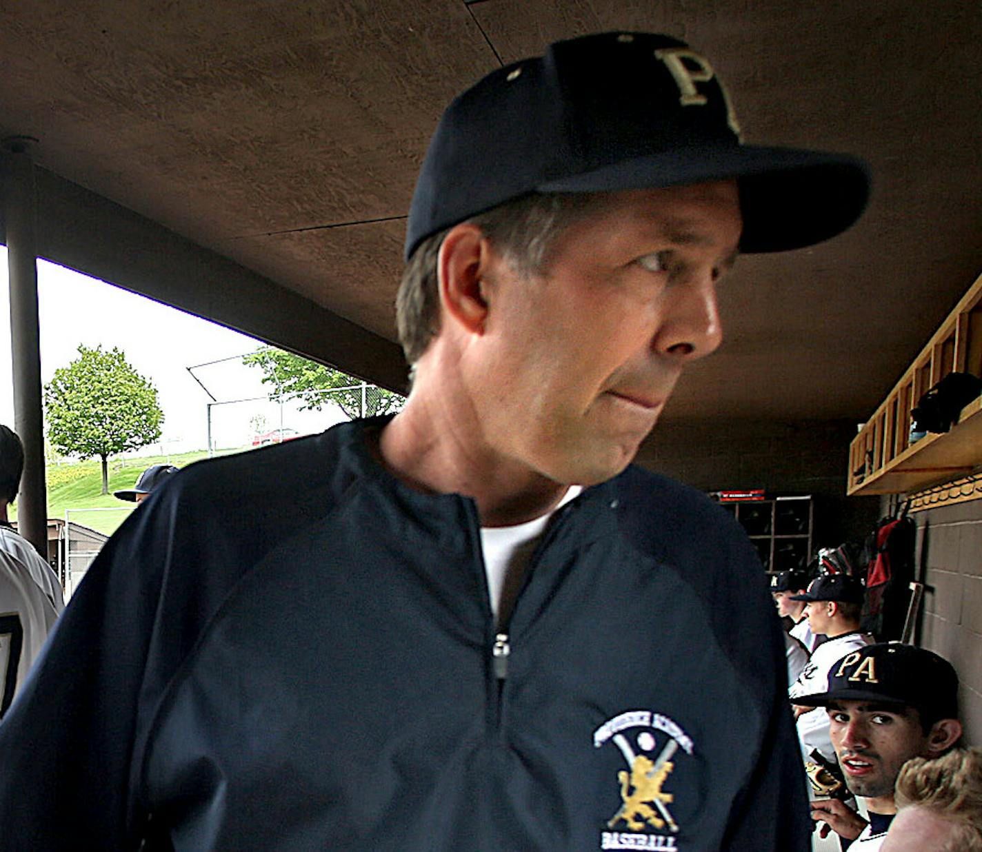 Providence Academy head coach Kevin Tapani walked through the dugout prior to a sectional baseball game against Brooklyn Center High School at Arnold Klaers Baseball Field (Providence&#xed;s home field) in Loretto. ] (JIM GEHRZ/STAR TRIBUNE) / May 24, 2013, Loretto, MN &#xf1; BACKGROUND INFORMATION- Providence Academy&#xed;s baseball team is coached by former Minnesota Twins pitcher Kevin Tapani. Providence is a private school that was created 12 years ago but has already won three small-school