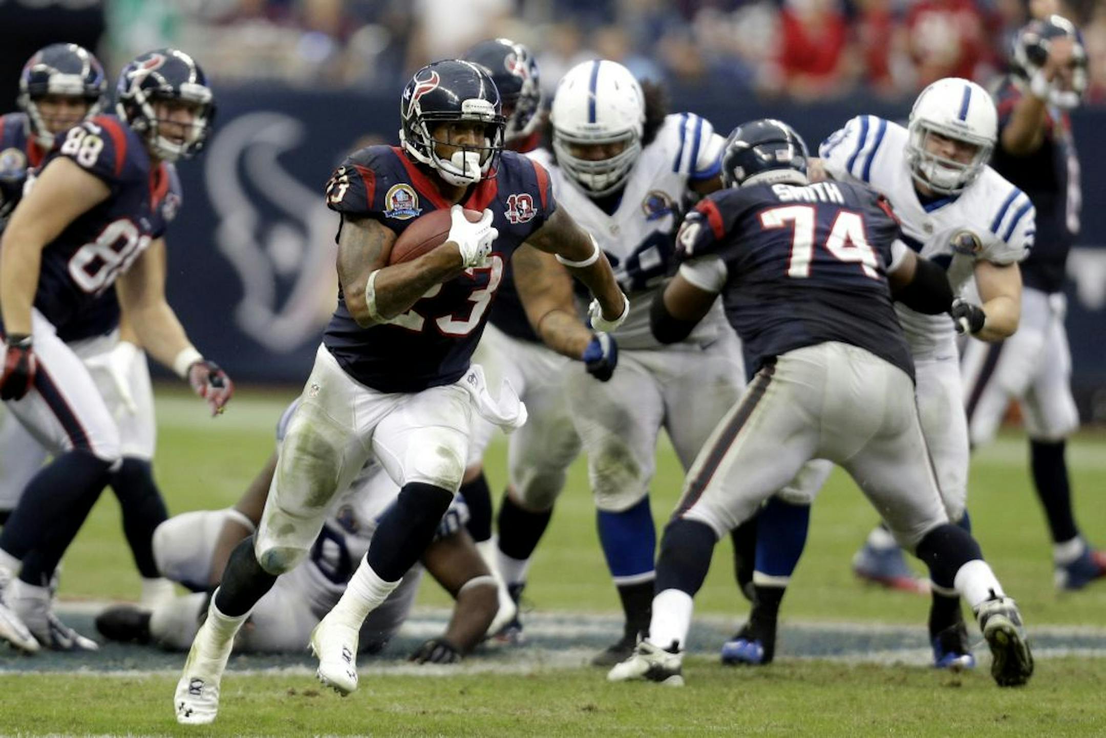 Houston Texans running back Arian Foster rushes for a gain against the Indianapolis Colts.