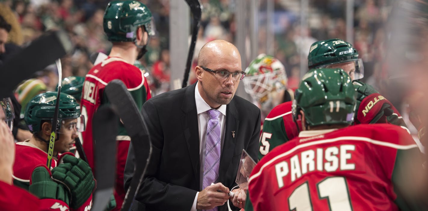 Minnesota Wild head coach Mike Yeo talked to left wing Zach Parise (11) during a break in action during the third period Tuesday. ] (AARON LAVINSKY/STAR TRIBUNE) aaron.lavinsky@startribune.com The Minnesota Wild played the Edmonton Oilers on Tuesday, Oct. 27, 2015 at Xcel Energy Center in St. Paul, Minn.