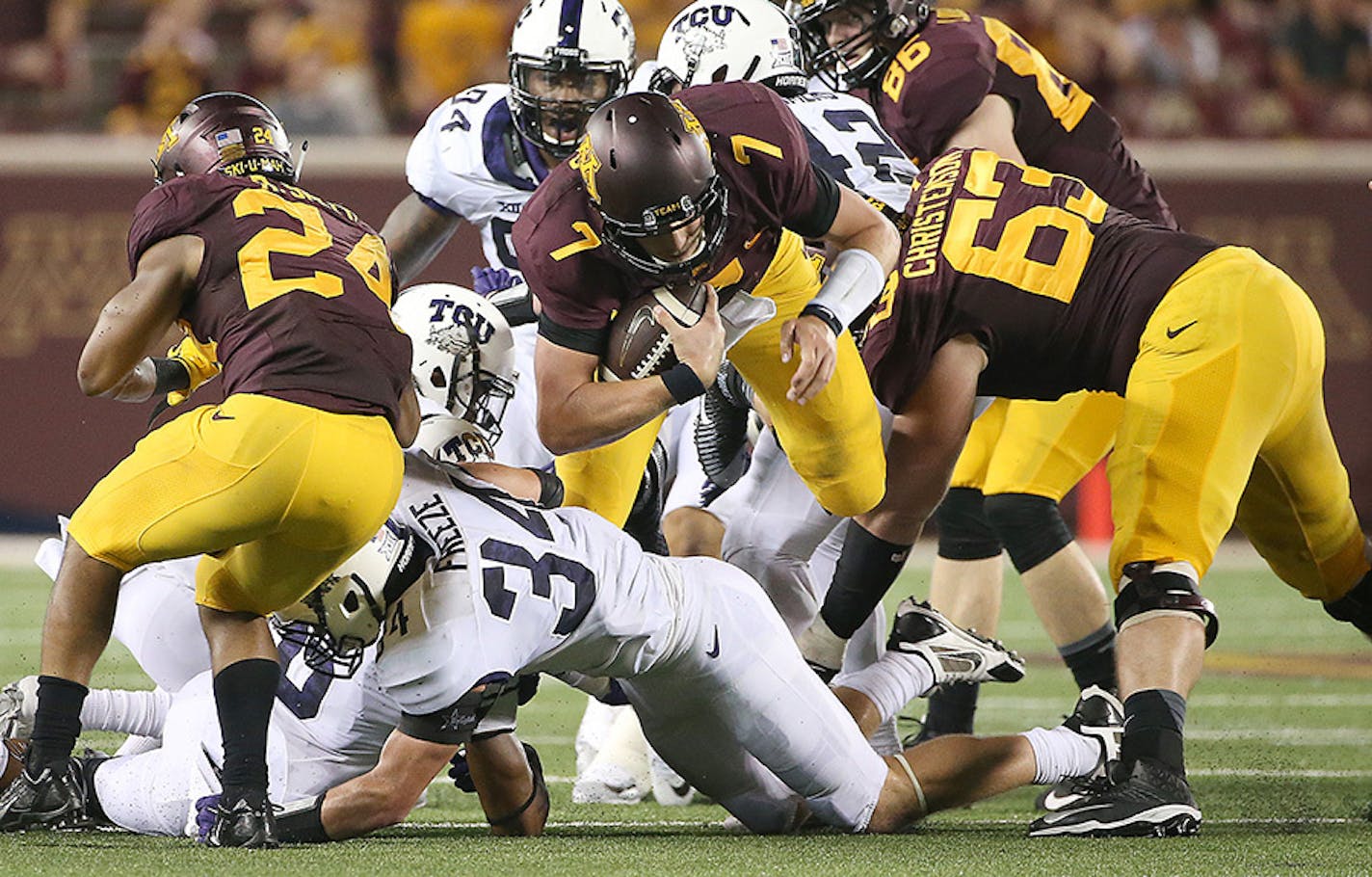 Gophers quarterback Mitch Leidner carried the ball during the fourth quarter. He played the game against TCU minus two starting offensive lineman.