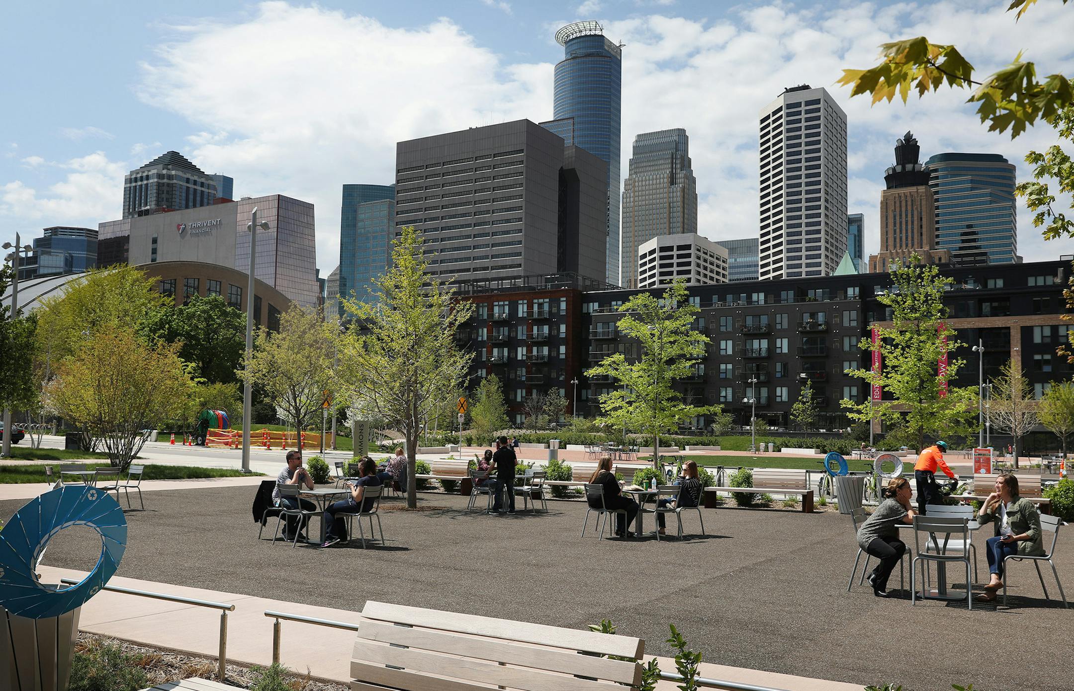 Visitors enjoyed the warm weather Friday. ] ANTHONY SOUFFLE ï anthony.souffle@startribune.com Visitors enjoyed the warm weather Friday, May 12, 2017 at Downtown East Commons in Minneapolis. The park opened nearly a year ago, but this is the first summer that visitors will be able to take full advantage of the downtown Minneapolis park. Green Minneapolis, the nonprofit conservancy that manages Downtown East, has planned a season's worth of daily and one-time attractions including classes and
