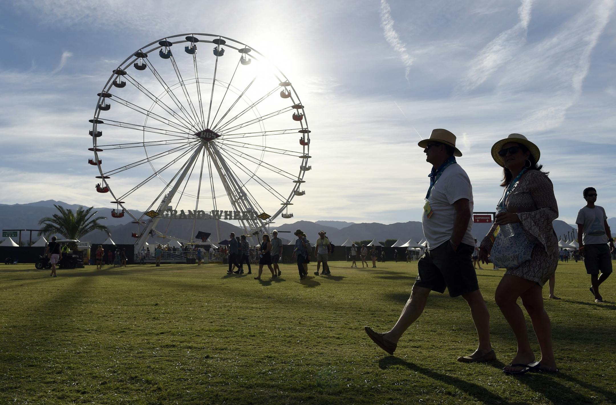 Festivalgoers walk through the Empire Polo Field on day 1 of the 2016 Desert Trip music festival on Friday, Oct. 7, 2016, in Indio, Calif.