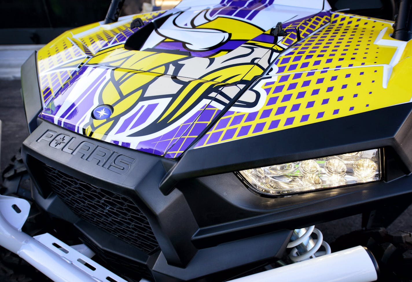 Polaris RZR with Vikings colors. ] GLEN STUBBE * gstubbe@startribune.com Monday, November 9, 2015 Polaris Industries has signed a 10-year multi-million contract with the Vikings that will name a gate at the new stadium the Polaris gate and offer a Polaris hallway of products for fans.