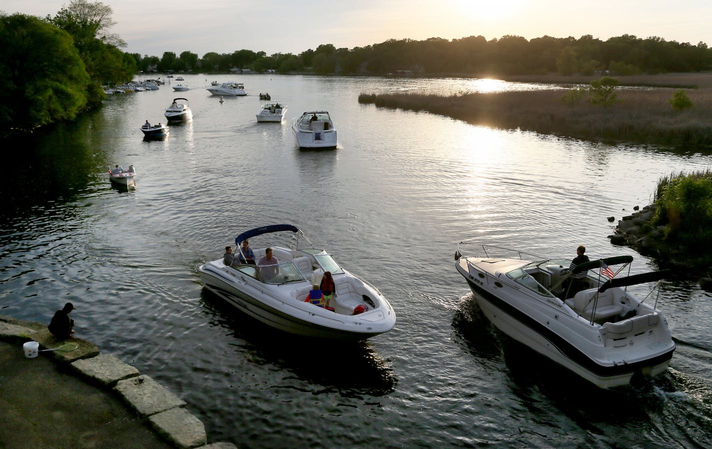 Boat traffic was heavy on Lake Minnetonka as daylight faded Friday, May 22, 2015, near Lord Fletcher's in Spring Park, MN.](DAVID JOLES/STARTRIBUNE)djoles@startribune.com As boaters flock to Minnesota lakes and rivers this holiday weekend for the unofficial kick-off to the boating season, they'll face more inspections in and out of the water as local cities and counties ramp up their work to stop the spread of invasive species. Across the metro, more boat accesses will be staffed by watercraft i